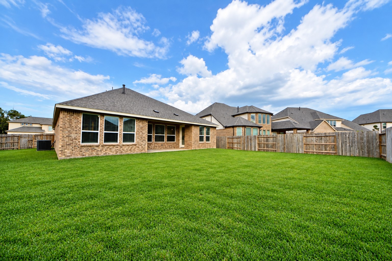 Upgraded almost all Brick Home with Huge Covered Patio!