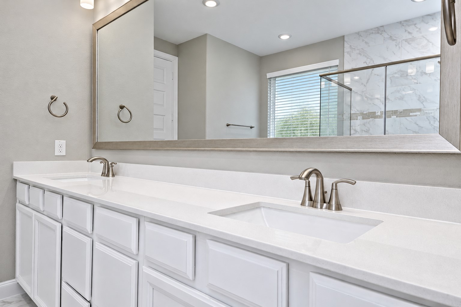 Main Primary Bathroom has Gorgeous Upgraded His and Her Private Under-mount Sinks, Upgraded Bathroom Faucets, Beautiful Quartz Counters and Back-Splash, Look at the Upgraded Framed mirror and More! No One has ever Lived in this home!