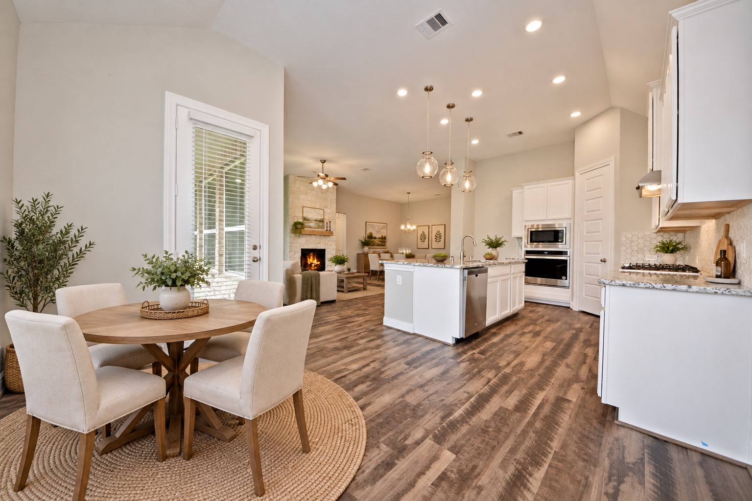 What a Wonderful Open Floor Plan! Upgraded Fully Glass Insulated Door to allow all that Natural Lighting in but no heat or cold! Look at that amazing Gourmet Kitchen!