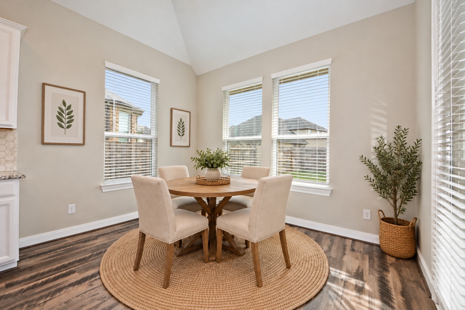 Wonderful Breakfast Area looking out to your Huge Backyard! 2 Inches Wood Faux Blind Included!