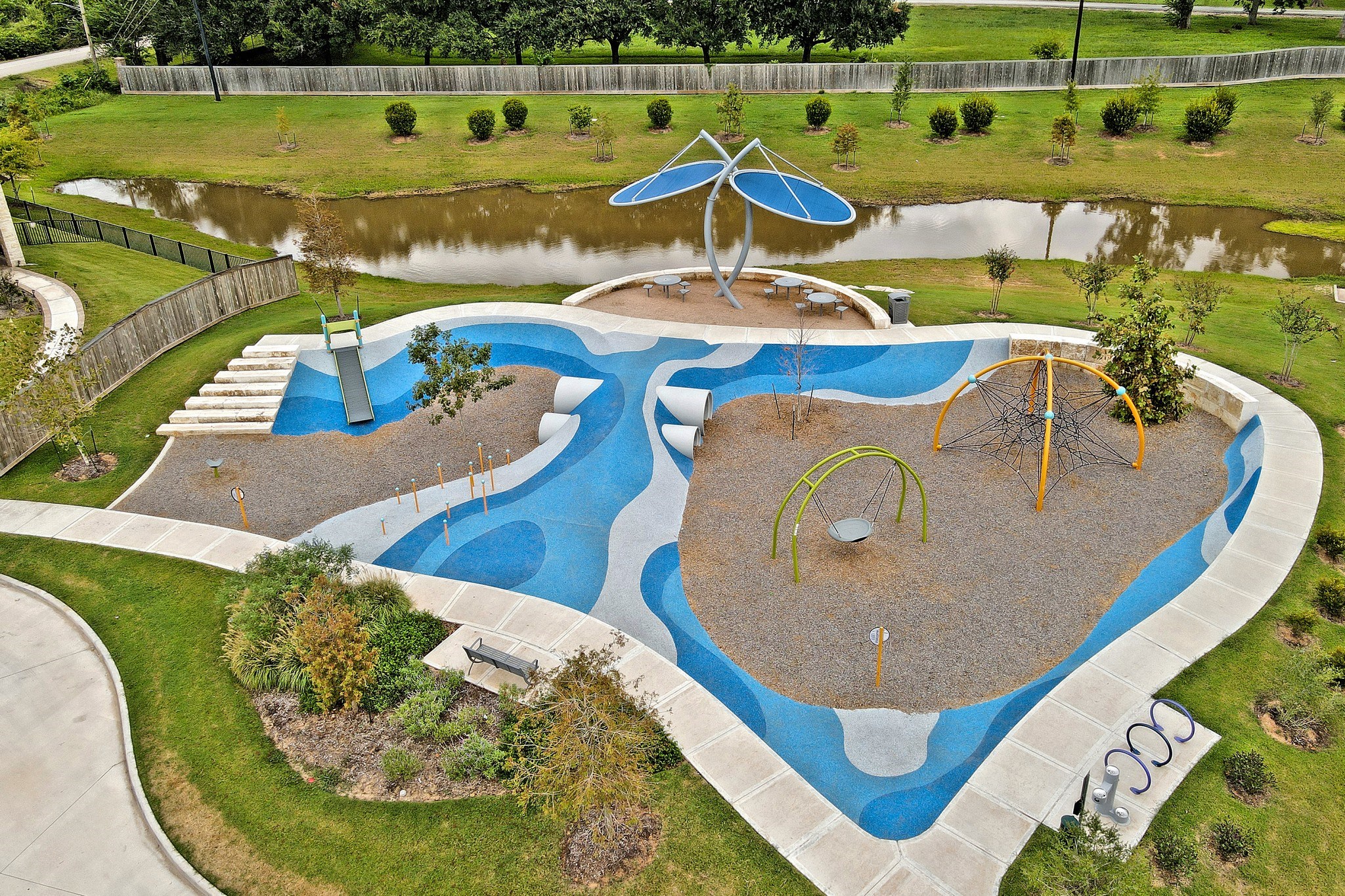 Just across the street Playground for all to have outdoor fun and more!