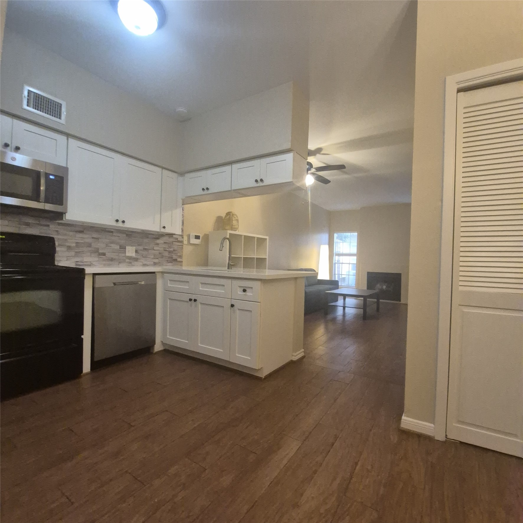 View of kitchen from dining/breakfast area