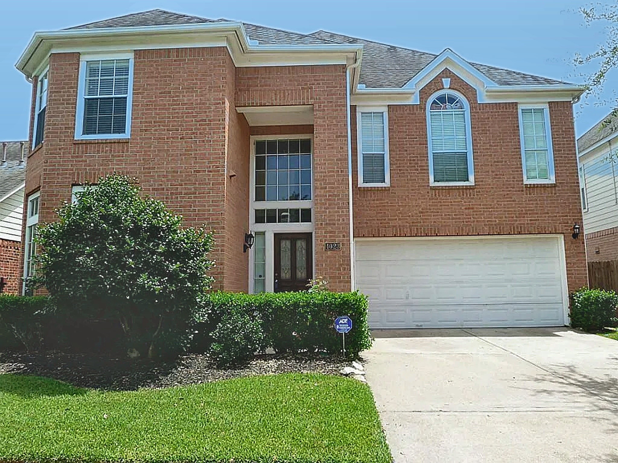 Charming two-story brick Perry home nestled in The Enclave, featuring a grand two-story covered entrance, attached two-car garage, manicured landscaping, and excellent curb appeal. Charming two-story brick Perry home nestled in The Enclave, featuring a grand two-story covered entrance, attached two-car garage, manicured landscaping, and excellent curb appeal.