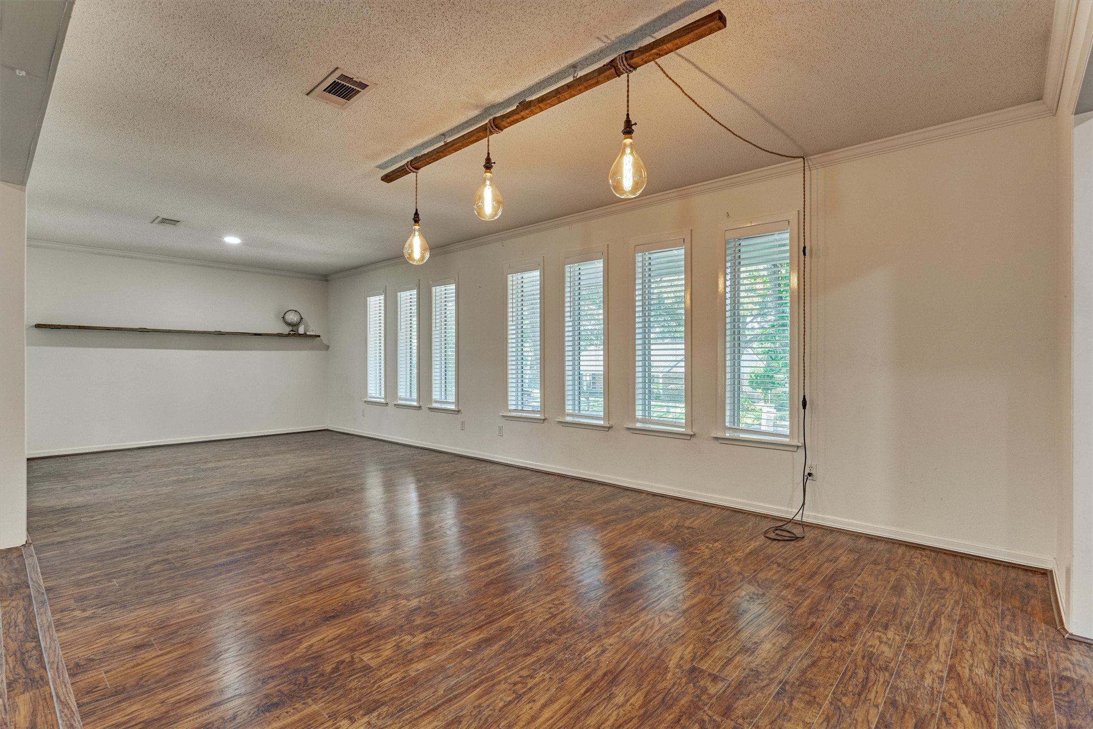 A beautiful wall of windows fills the space with natural light.