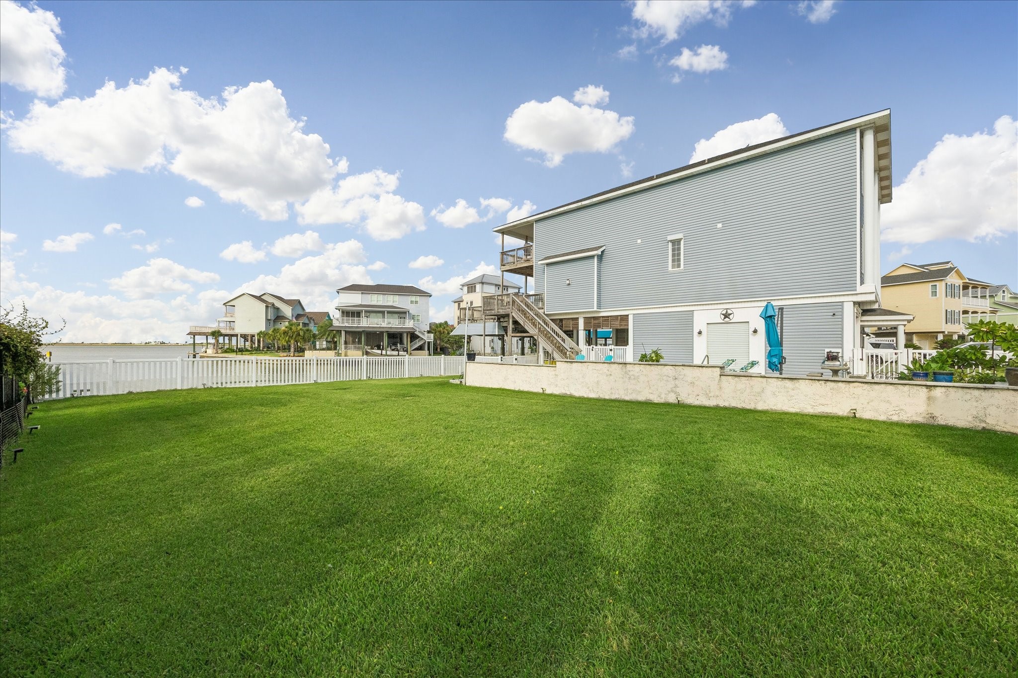 Plenty of green space for outdoor activities, play, and enjoying time with your fur babies, all within the fully fenced property. Fresh landscaping has been added to the backyard.