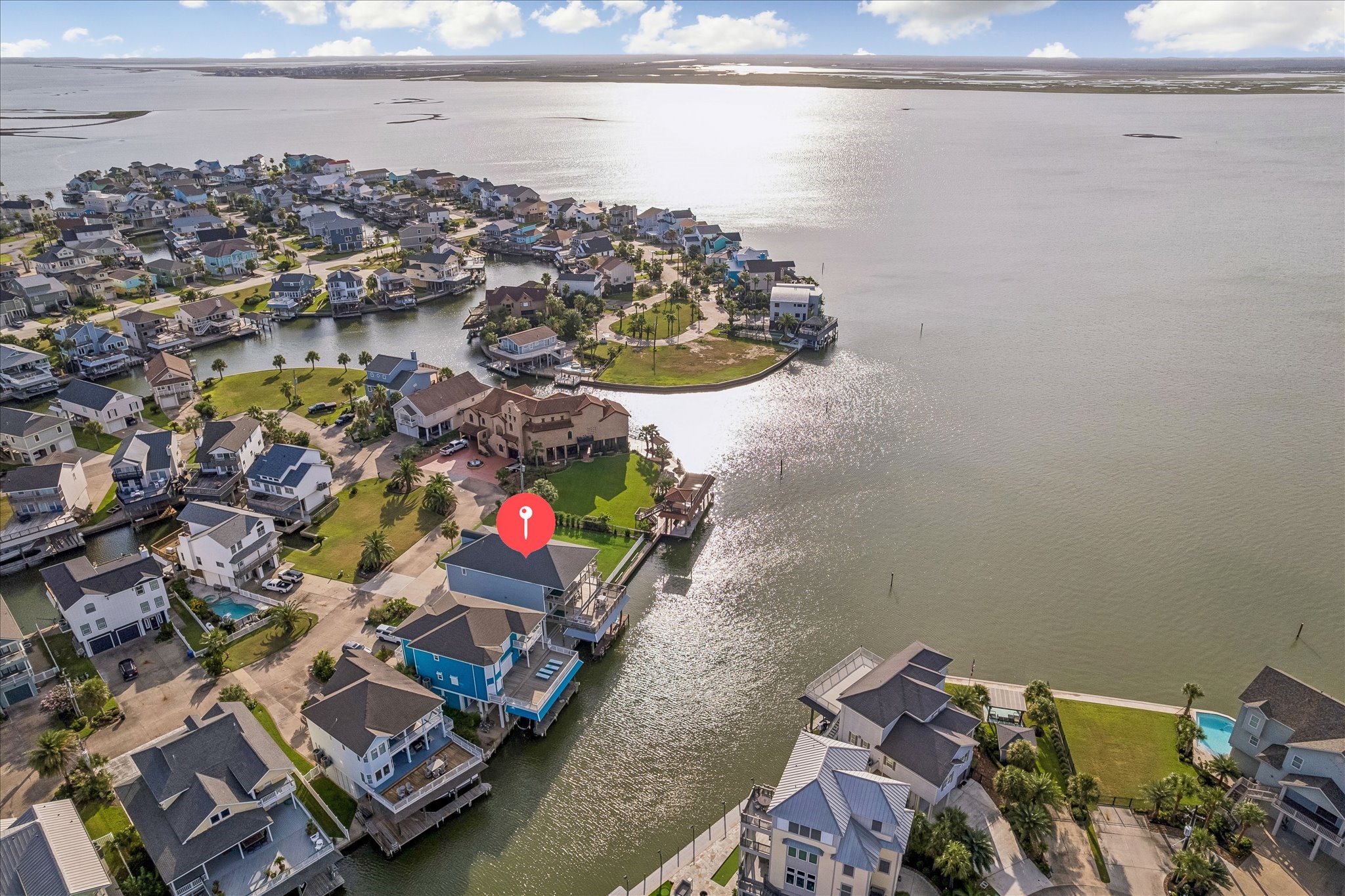 Enjoy breathtaking Bay sunsets from the waterfront, with easy access to the Bay system for boating, fishing, and days spent on the water.