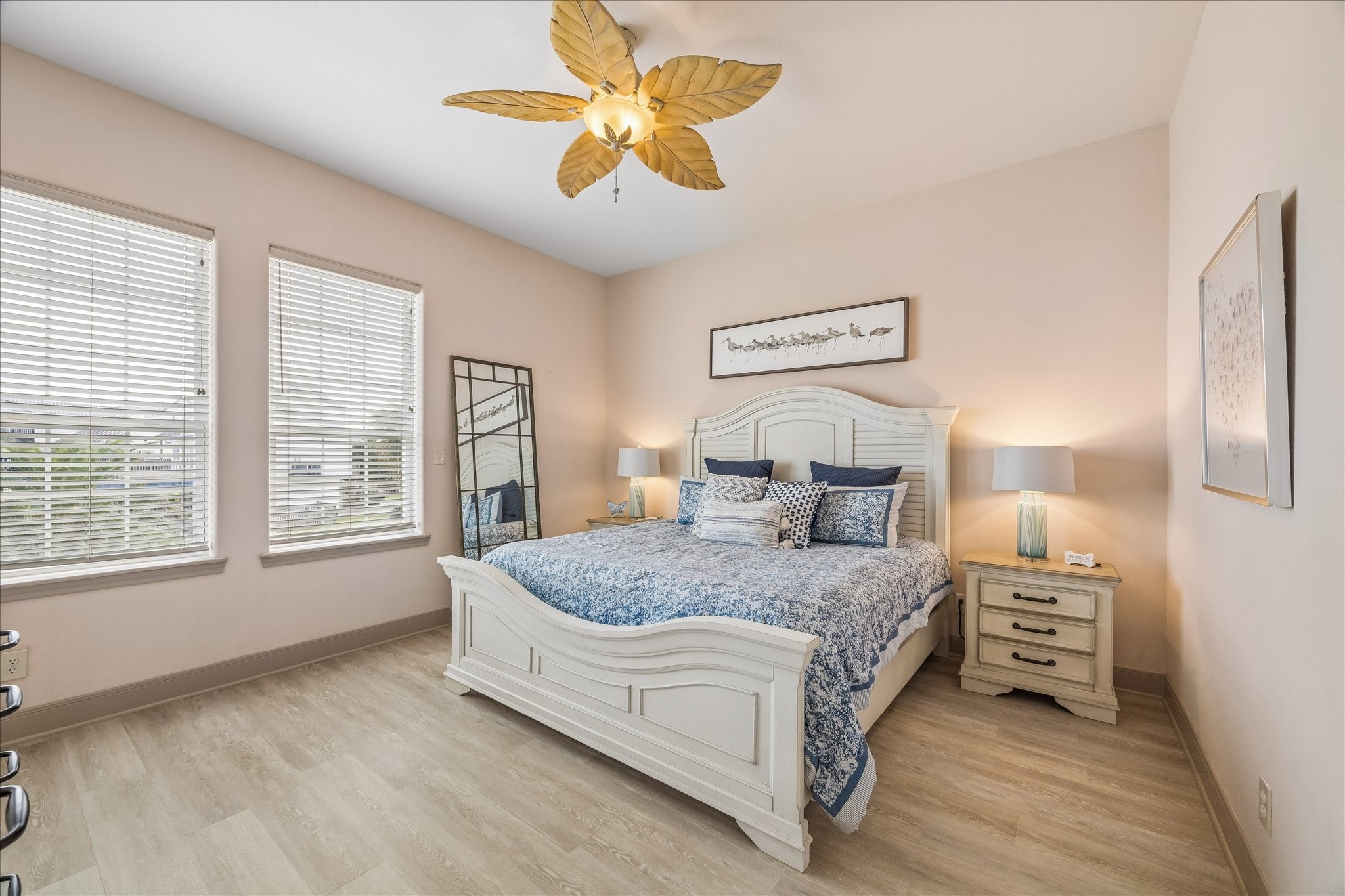 Comfortable & spacious 2nd level guest bedroom with vinyl wood look flooring and a walk-in closet. Front-facing windows provide natural light and views overlooking the front of the home, with convenient access to a full bath.