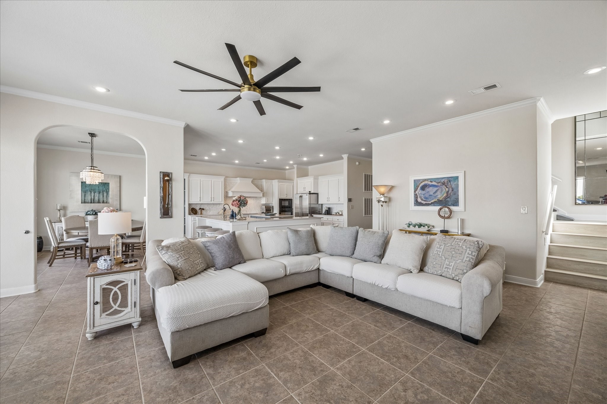 A comfortable gathering space with a coastal feel, perfect for relaxing or entertaining while enjoying spectacular sunsets.