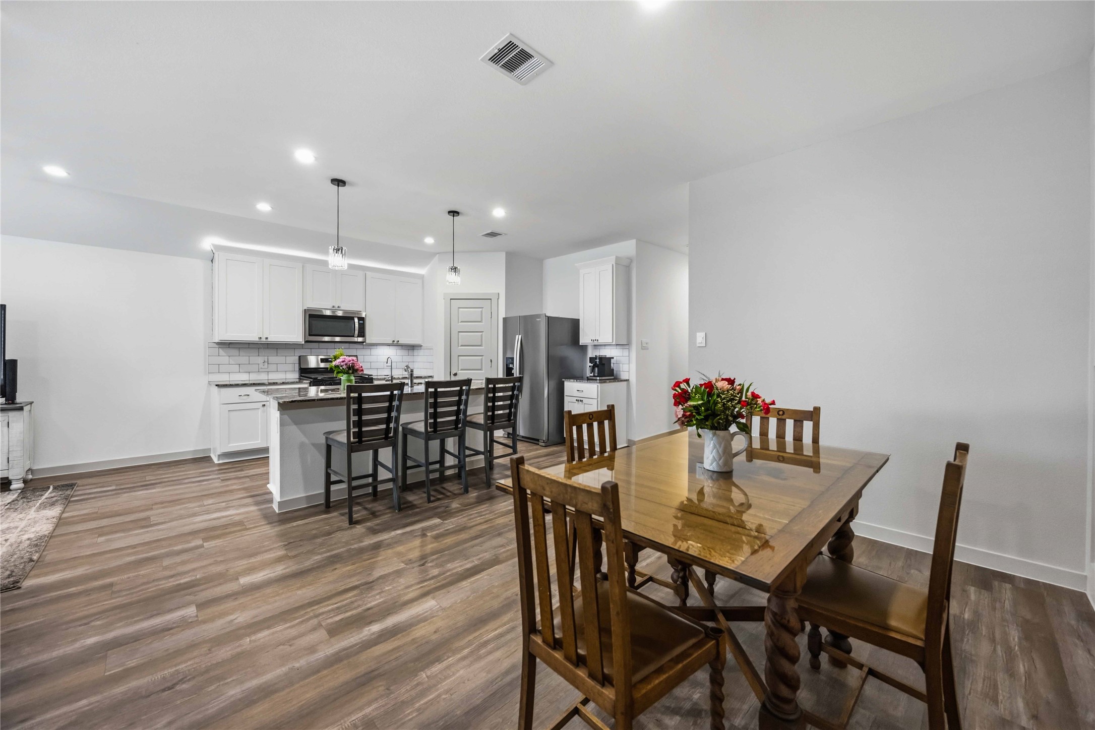 The dining room shows just how open the floor plan is.