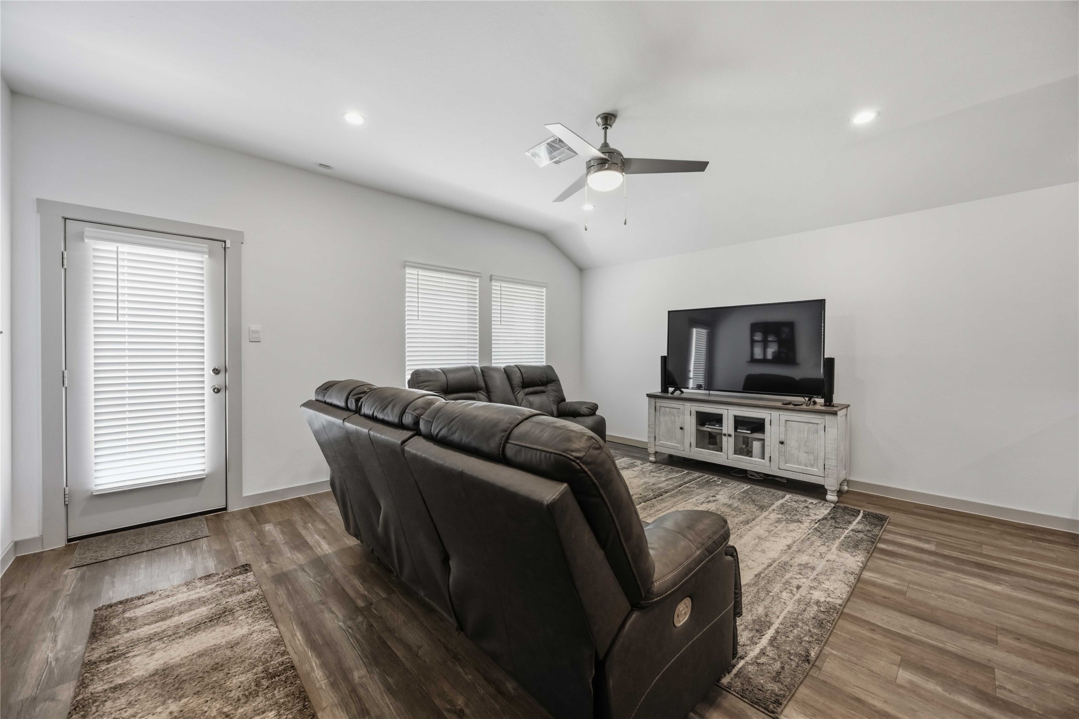 The Harris plan offers life proof vinyl flooring, vaulted ceiling and large windows for natural light.