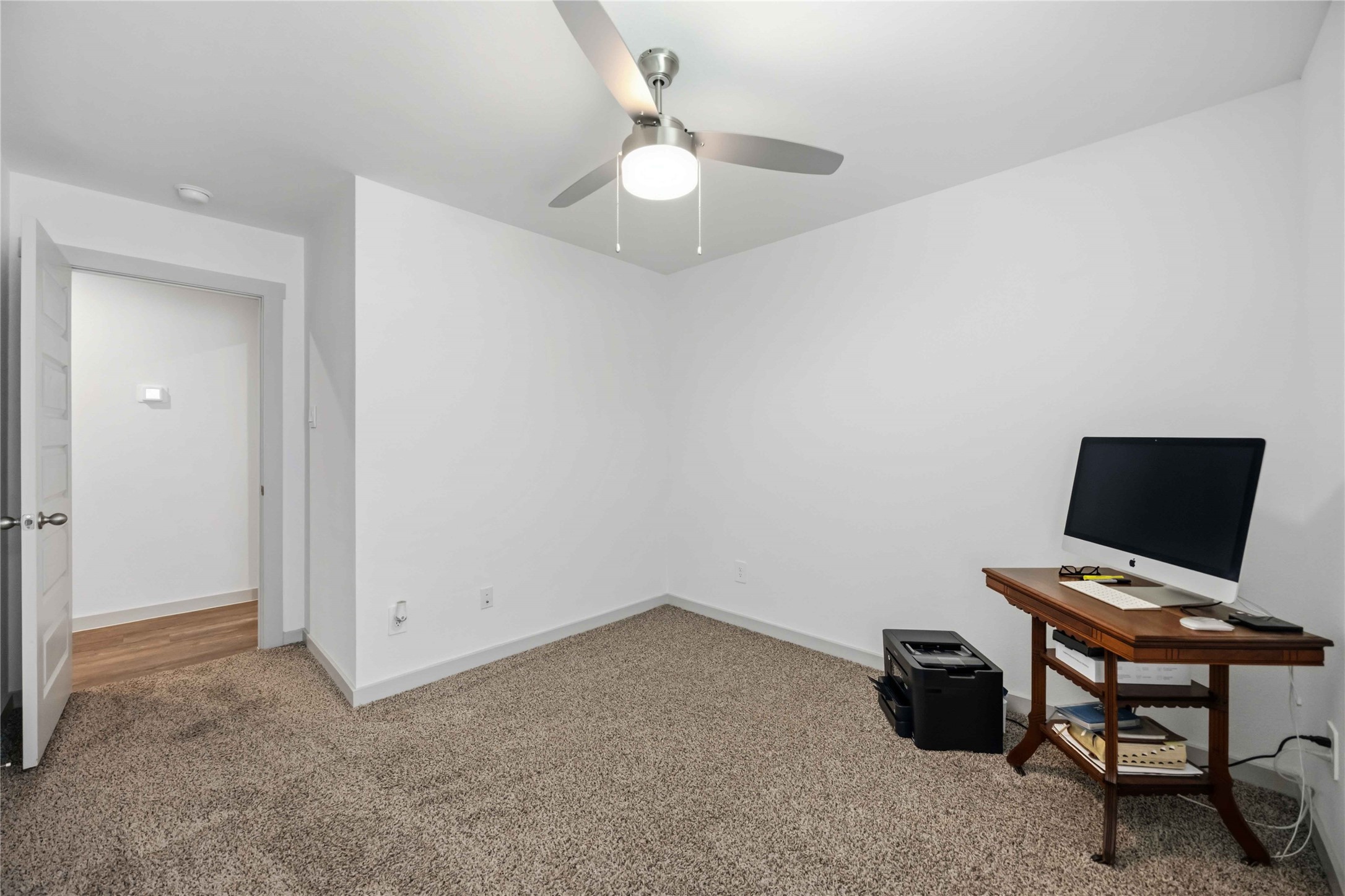 This room is between the half bath and the utility room.