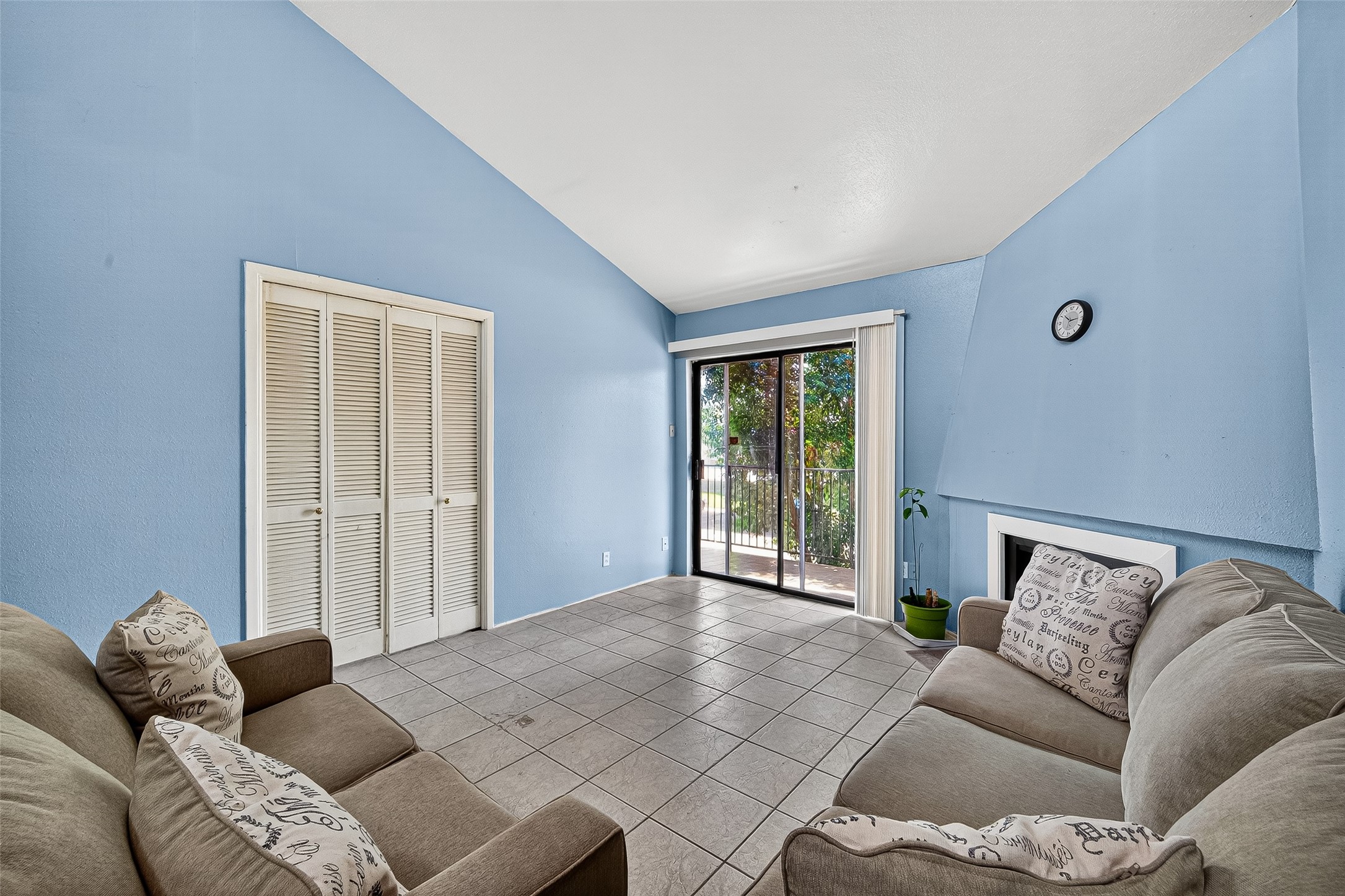 Living area with sliding glass door to the patio.