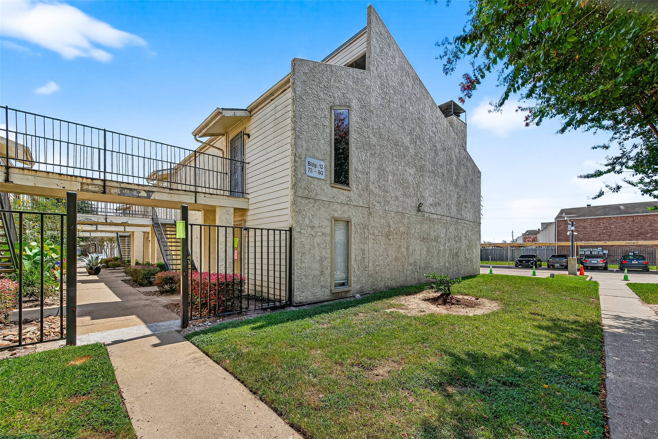 Convenient corner unit with easy parking access.