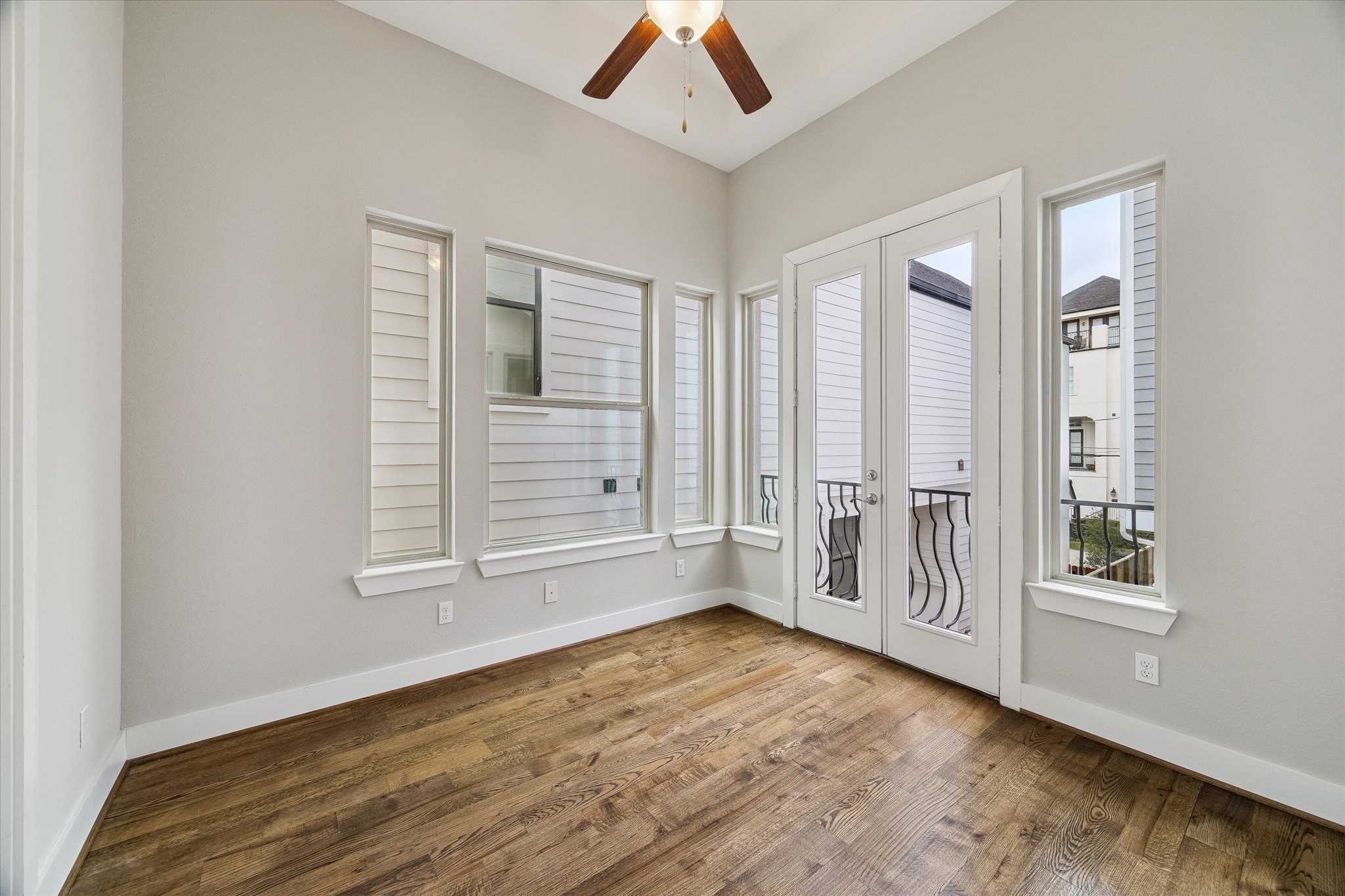 Second bedroom off the kitchen with an ensuite bathroom. This room would make a great office or flex room and the full bathroom is perfect for guests.