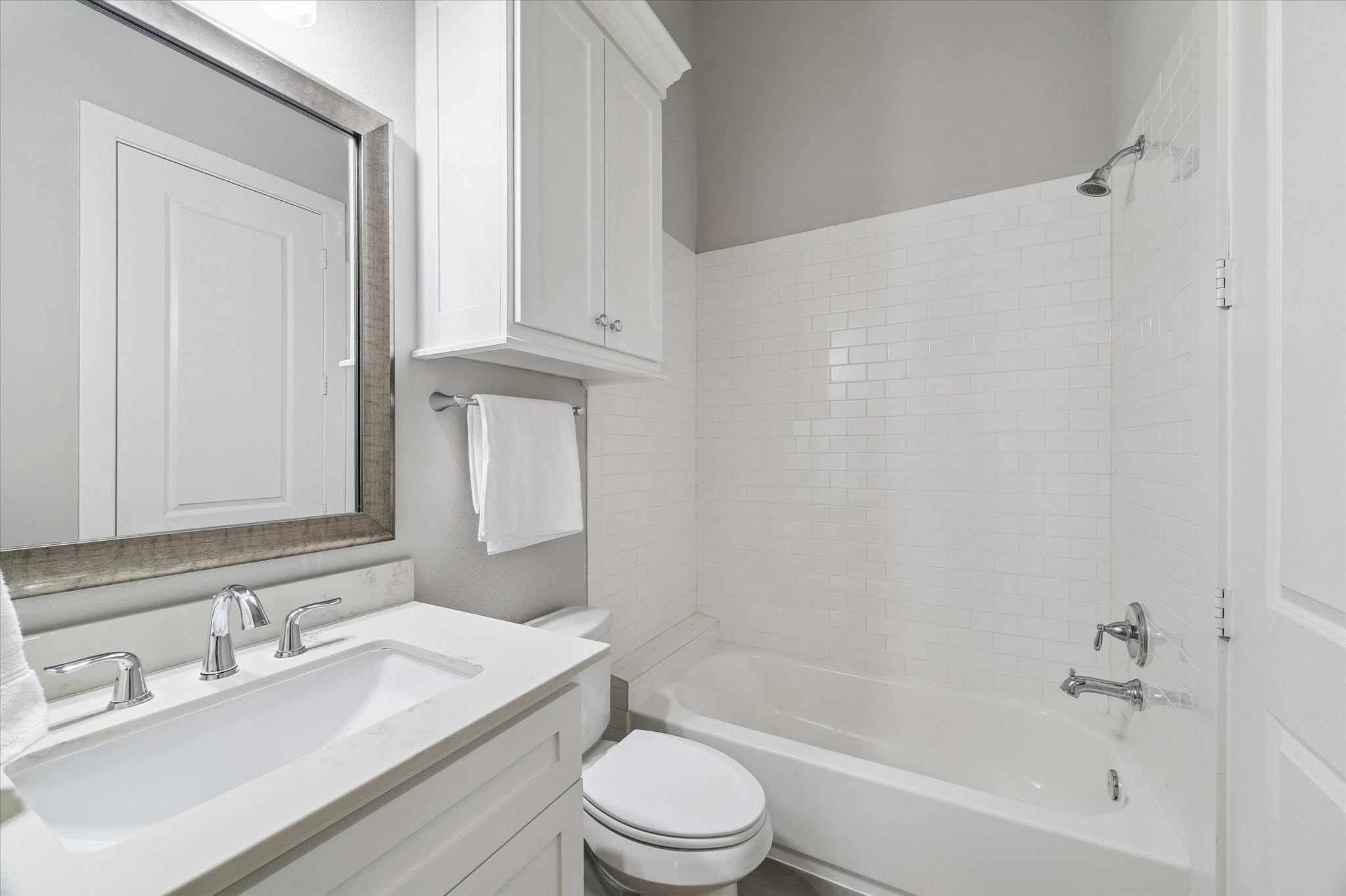 Full bathroom on the second floor by the kitchen.