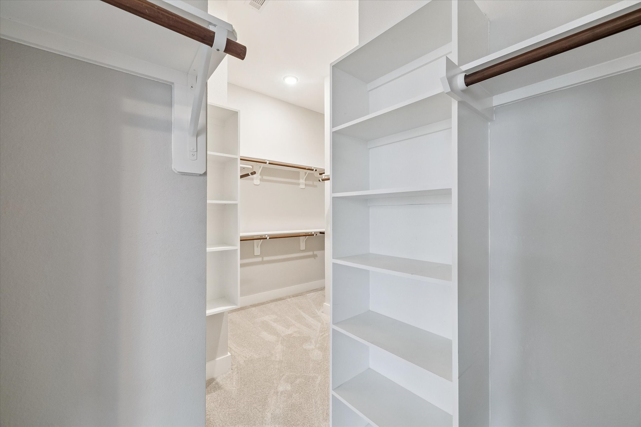 One of two oversized primary closets.
