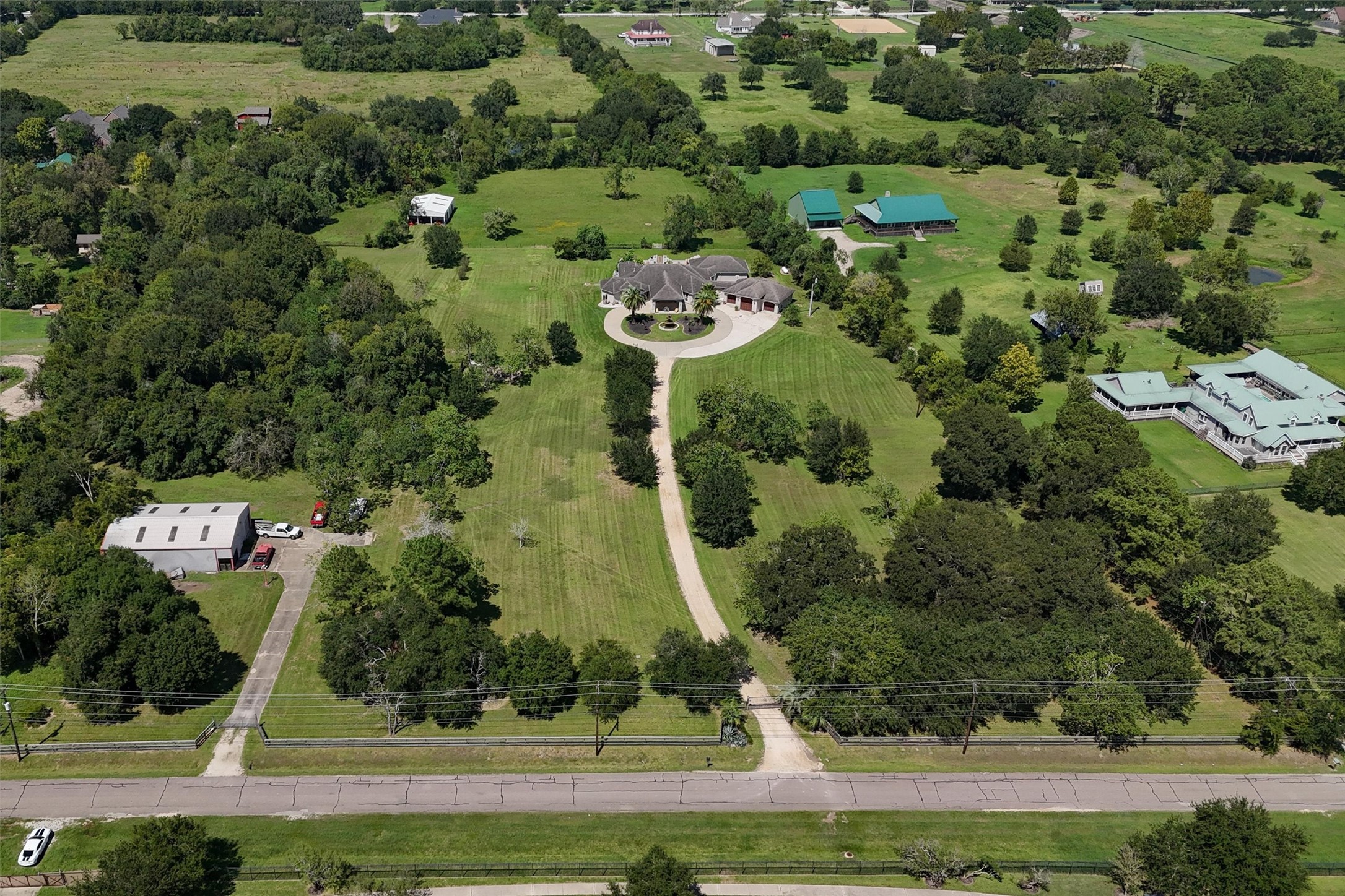 10 acres of prime real estate + 3000 sq ft shop with its own private entrance!