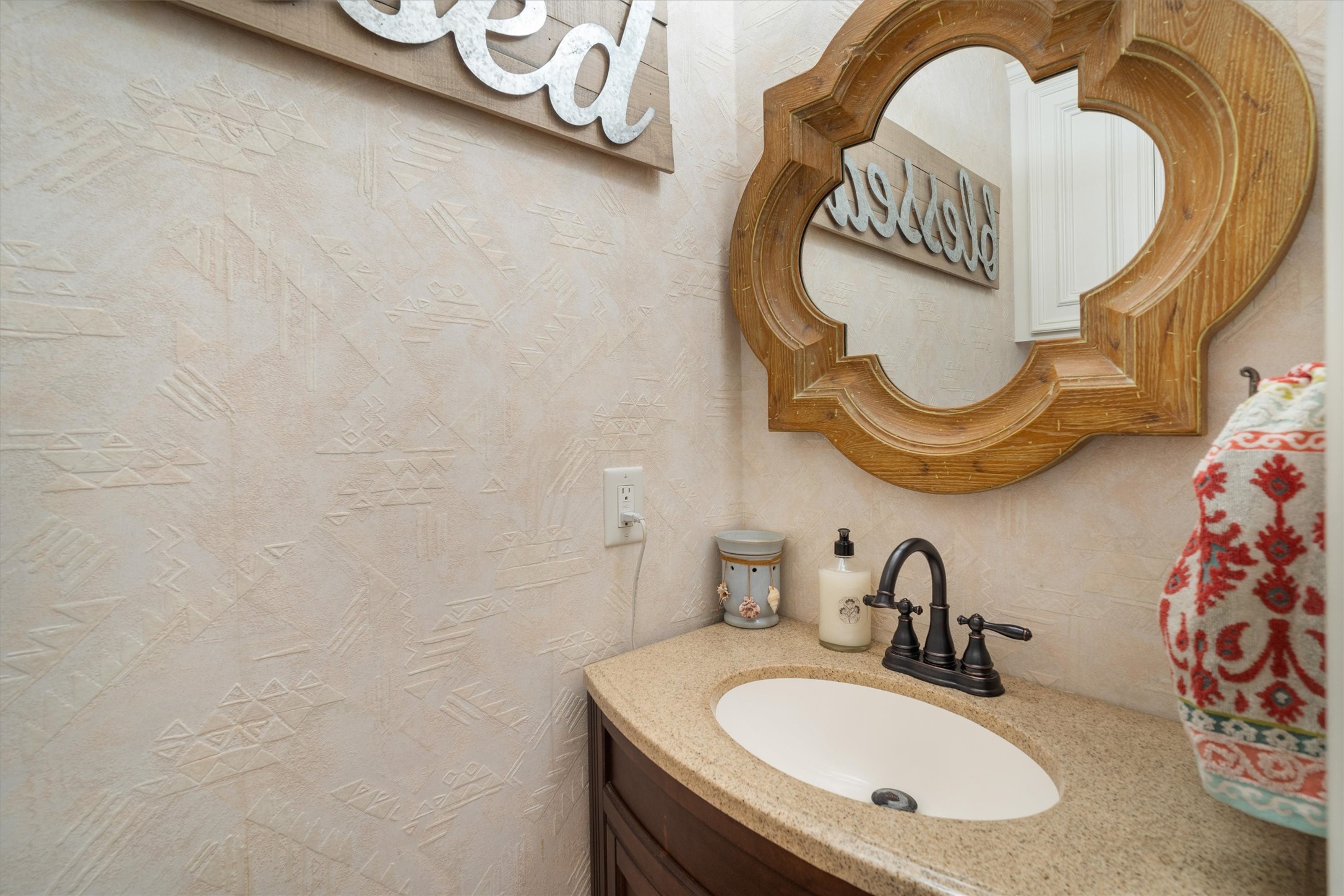 Half bath with framed mirror