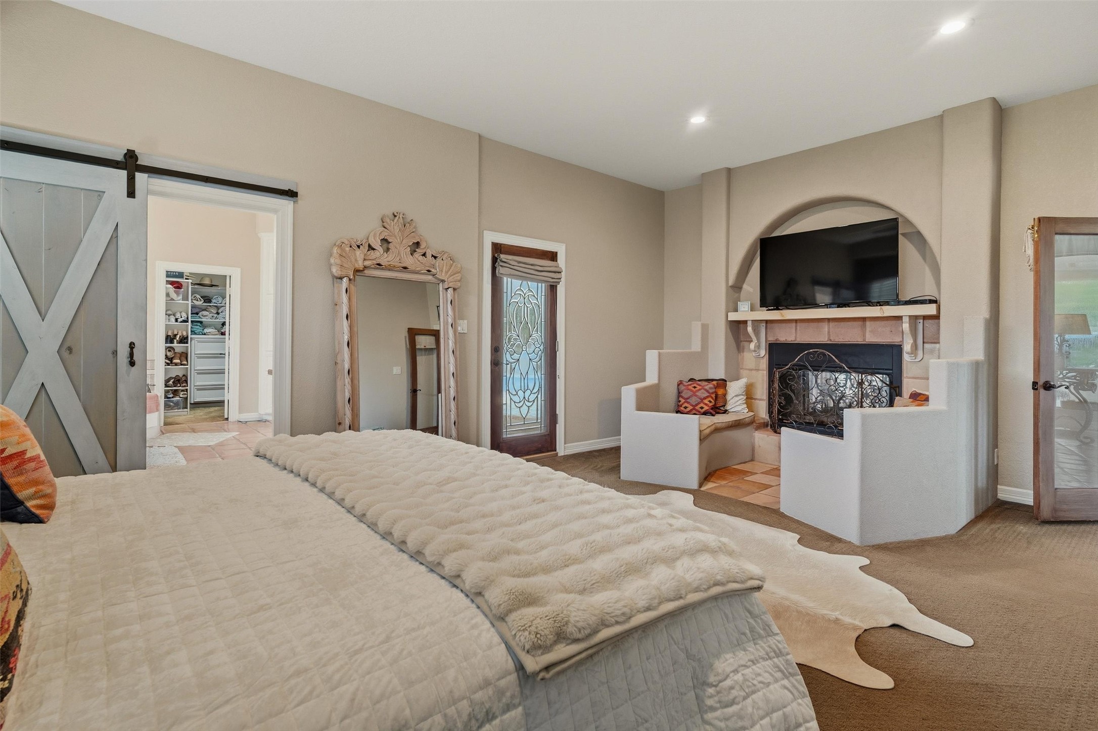 Primary en suite- double sinks, jacuzzi tub, and standalone seamless shower