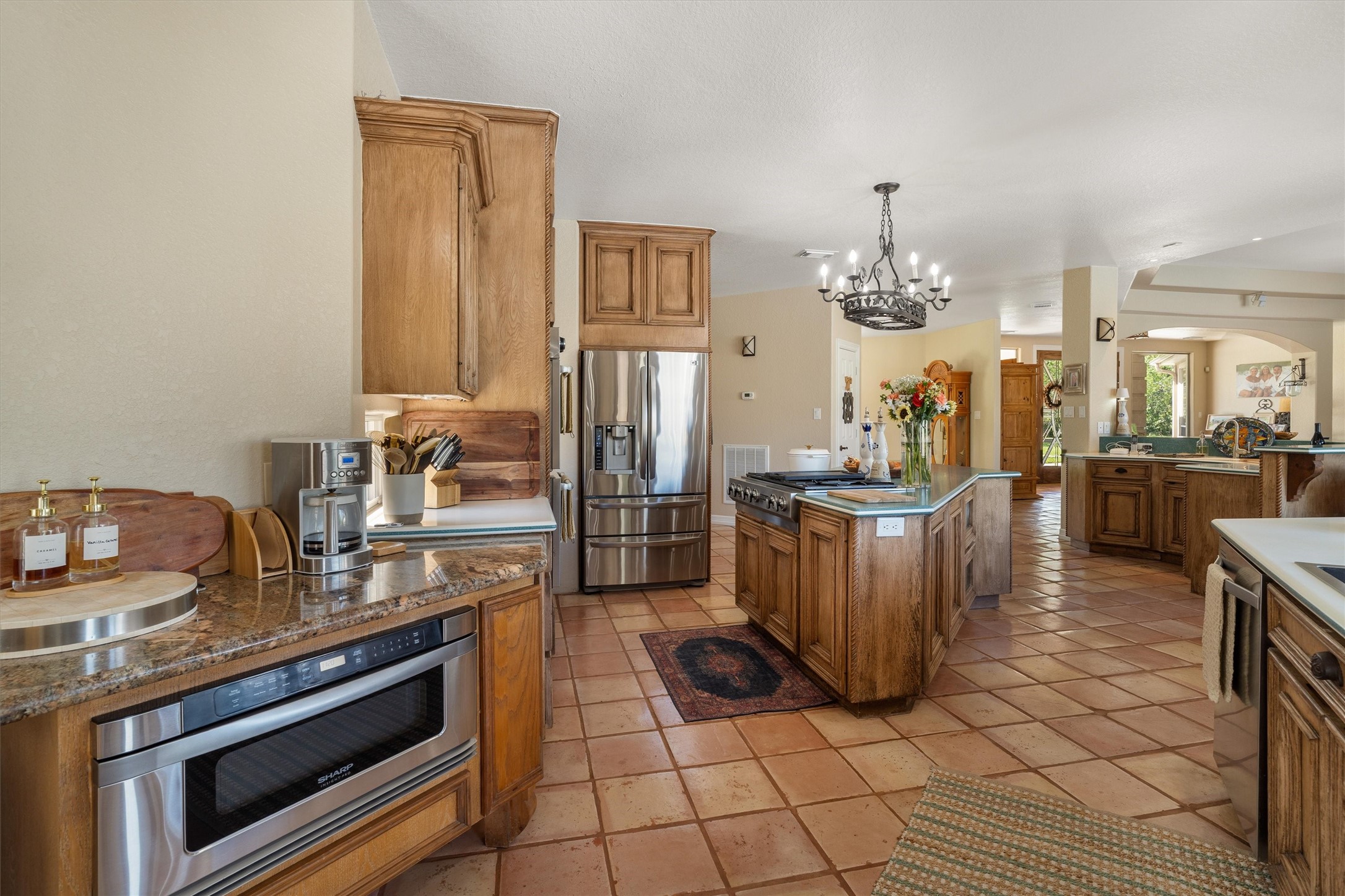 Extra countertop space with sink overlooking your beautiful back yard/acreage!