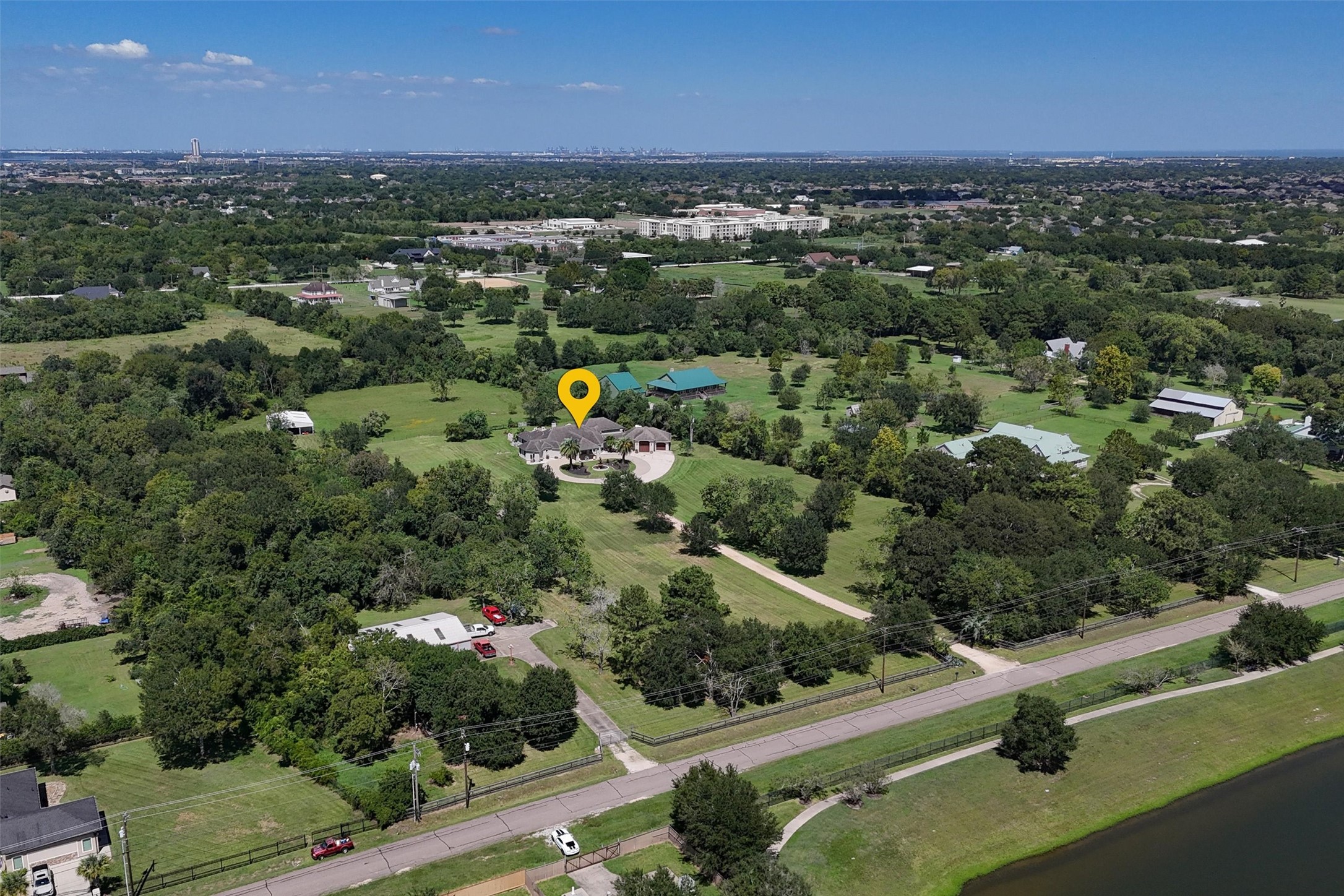 10 acres of prime real estate + 3000 sq ft shop with its own private entrance!
