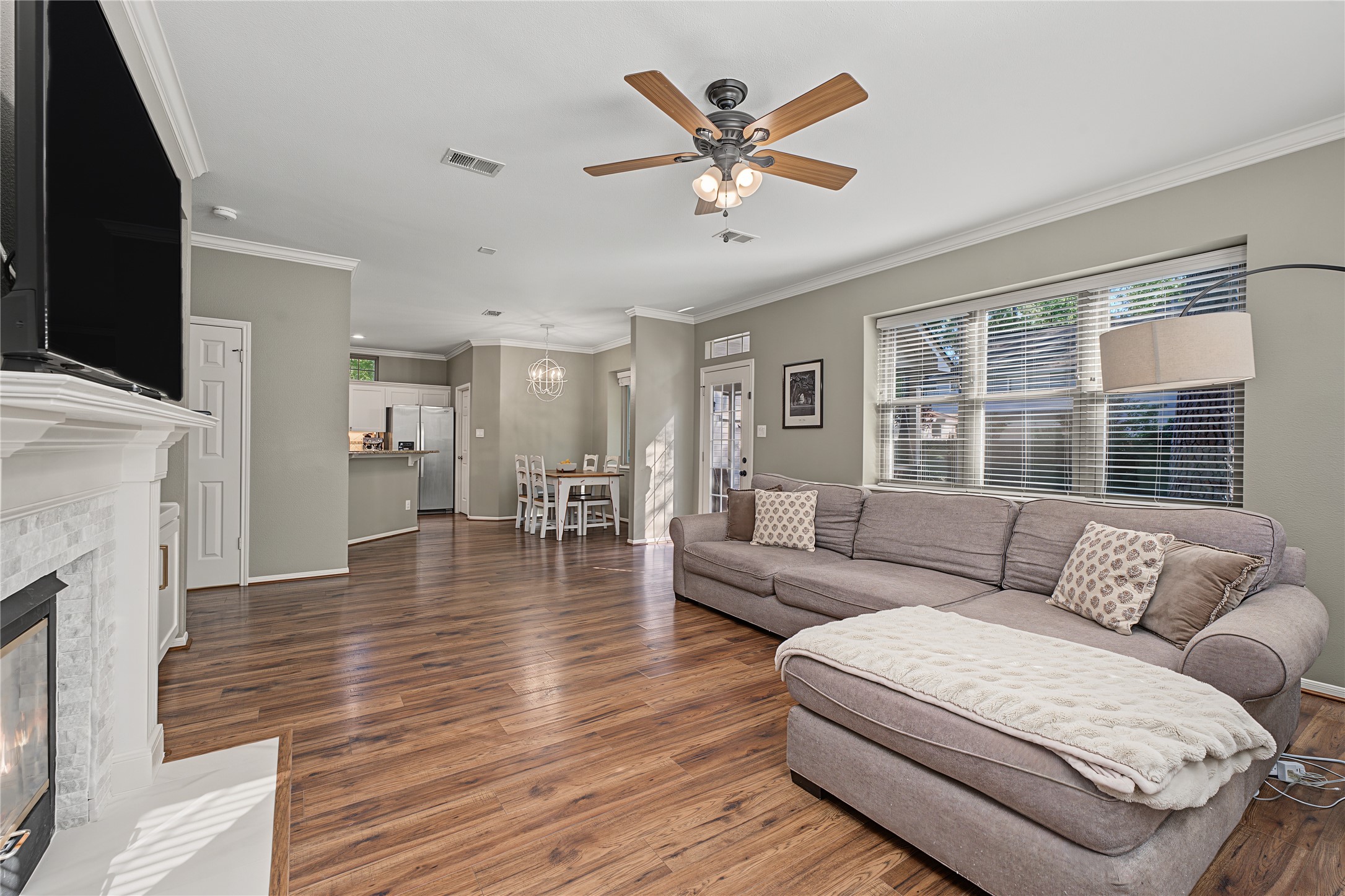 Open concept living and kitchen includes a cozy breakfast nook and bar seating.