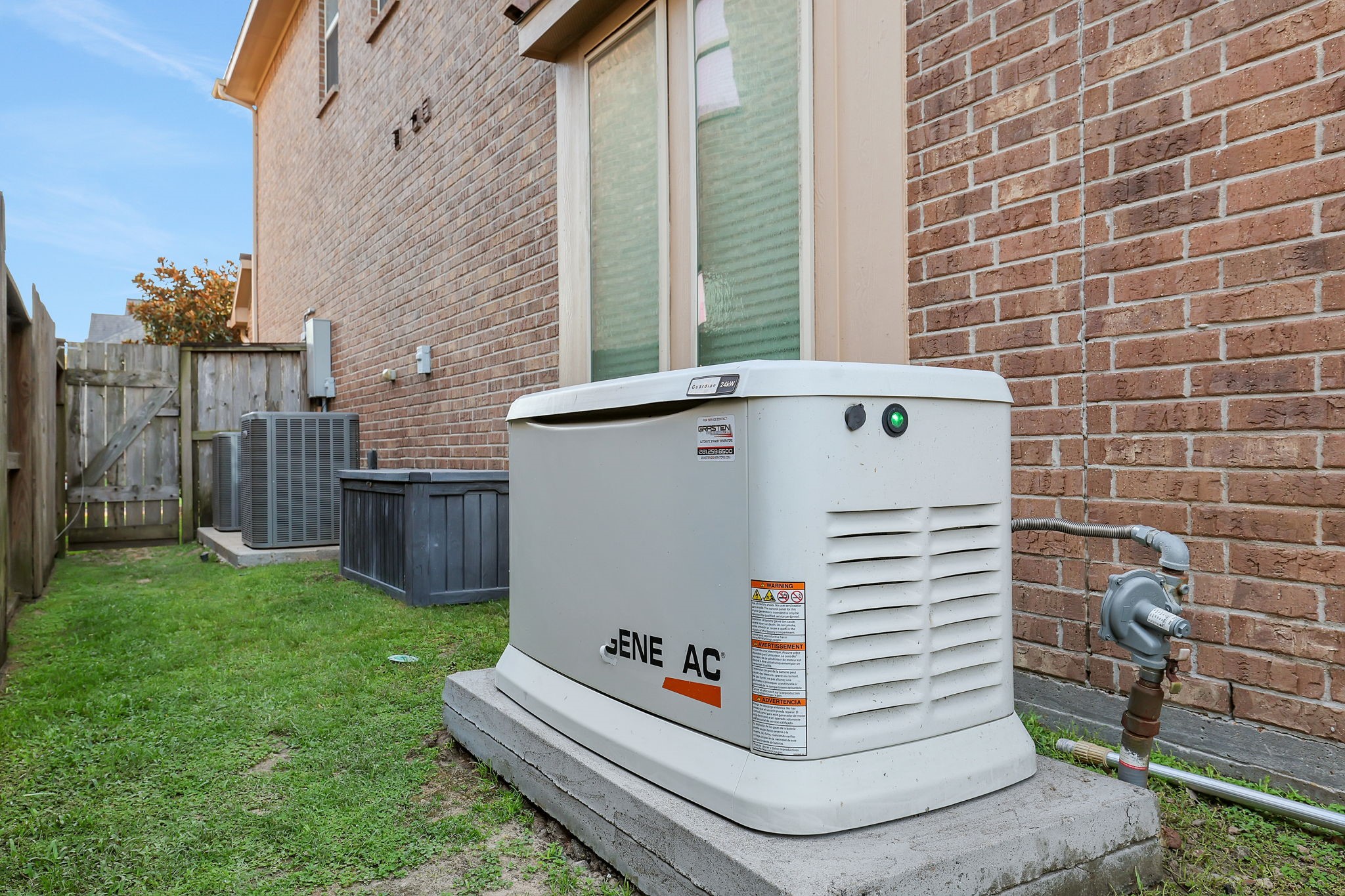 The home is equipped with a whole-home generator, delivering comfort and peace of mind.