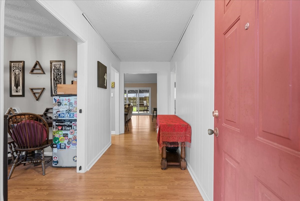 Entry foyer provides access to the dining area and leads toward the main living space.