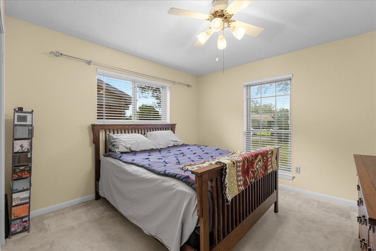 Additional bedroom with neutral finishes