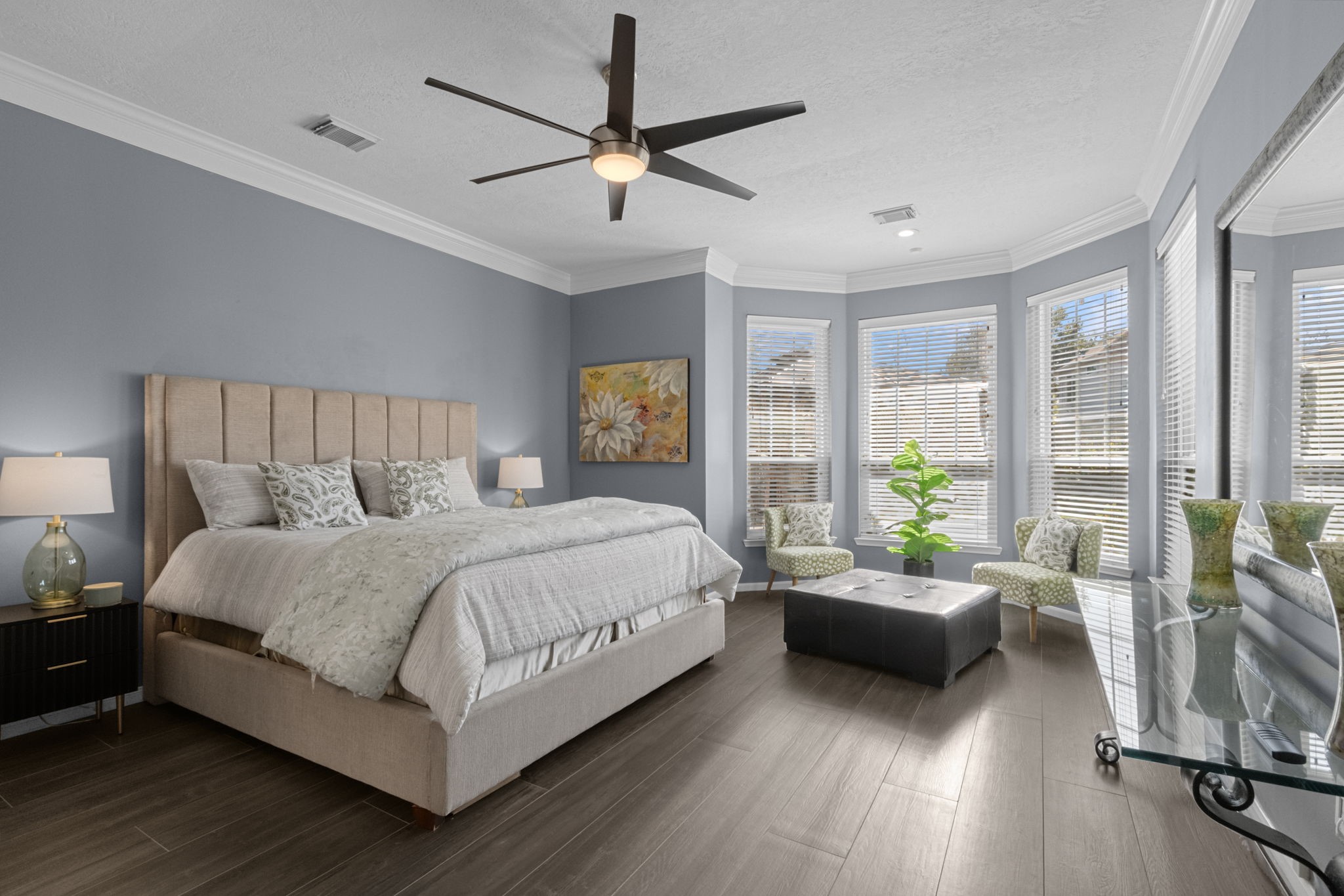 Relax in the tranquil primary suite.