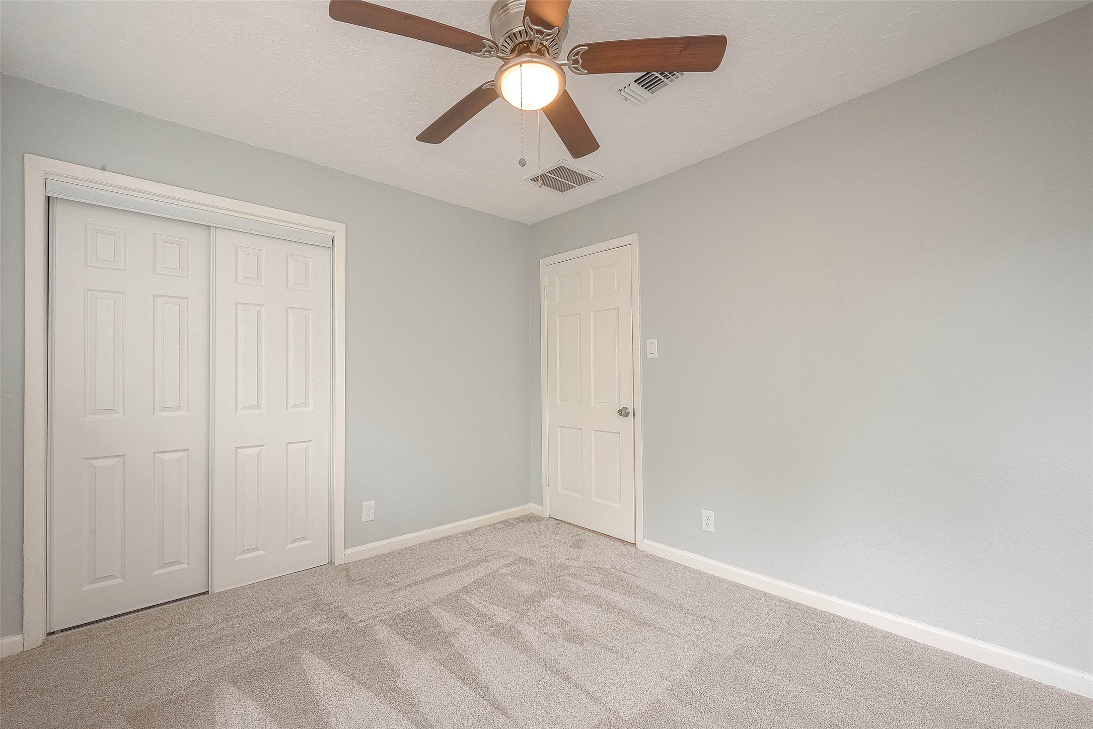 Other view of third bedroom.