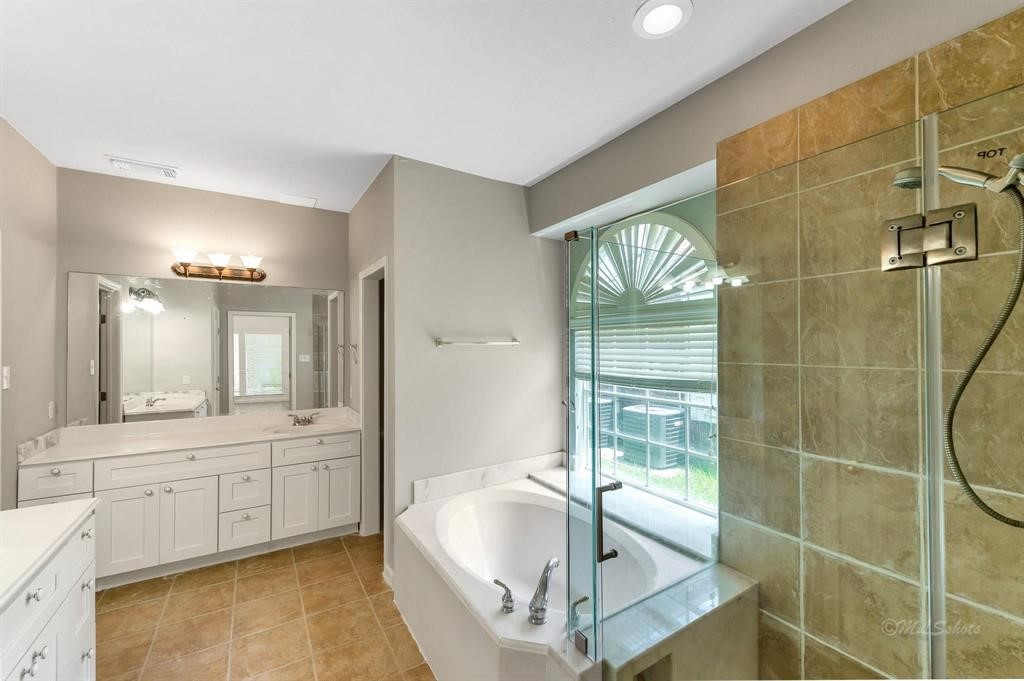 Primary Bathroom with Shower and Tub