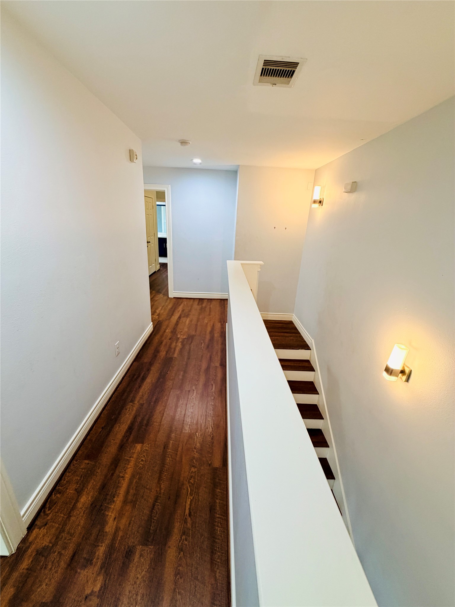 Staircase and hallway to the second floor.