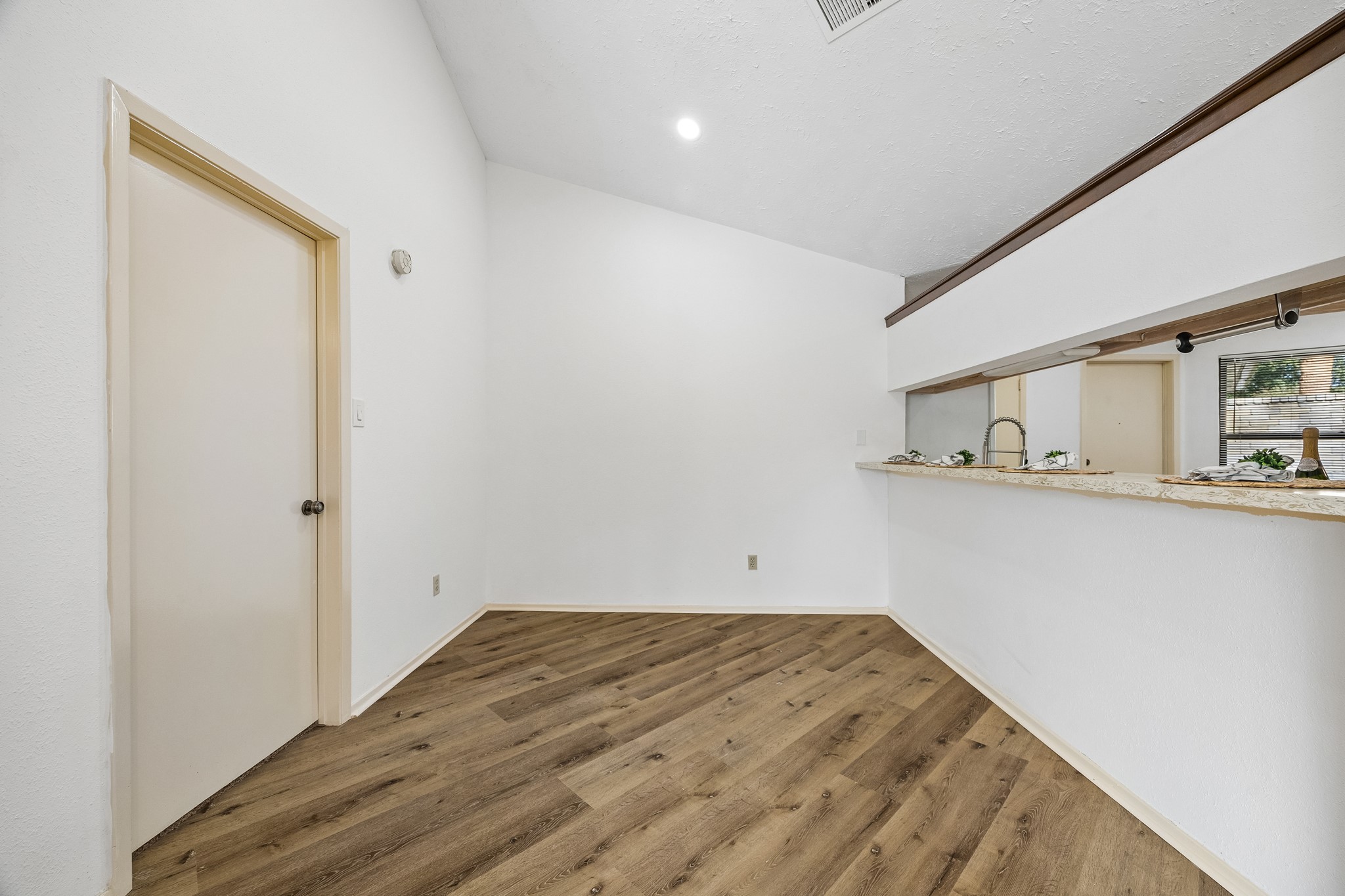 Formal dining space off the kitchen and primary bedroom.