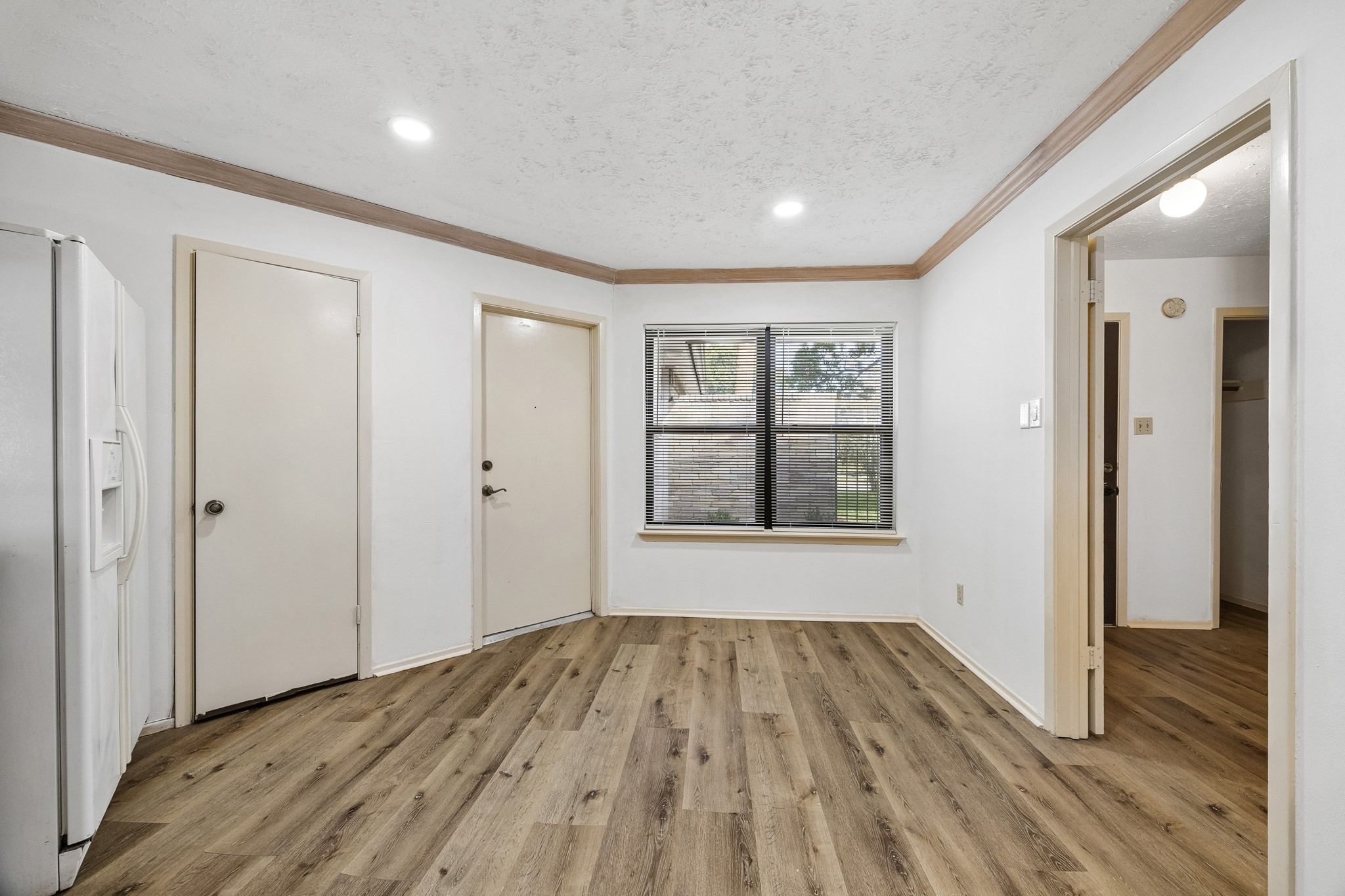 Kitchen includes eat-in space, walk-in pantry and easy access to the garage.