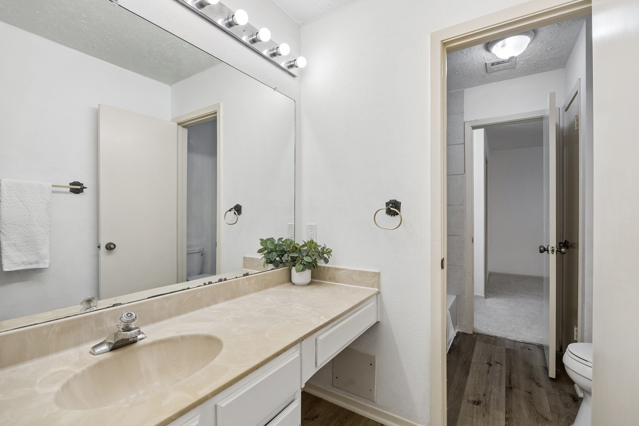Secondary bathroom is a Jack and Jill set up with this sink with vanity space is available for guest access and the other sink in secondary bedroom 3.