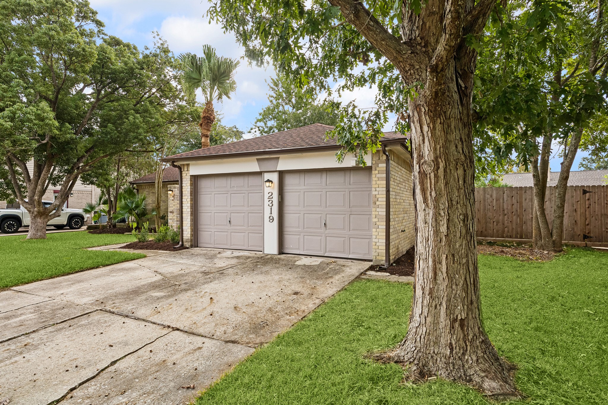 Two car garage with openers on both doors.