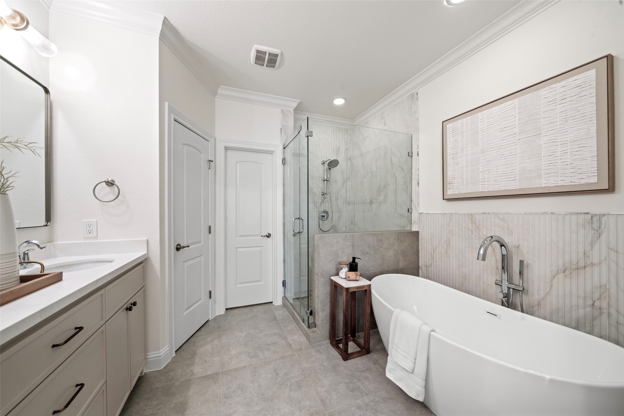 Primary en suite bathroom completely updated and the perfect respite at the end of the day.