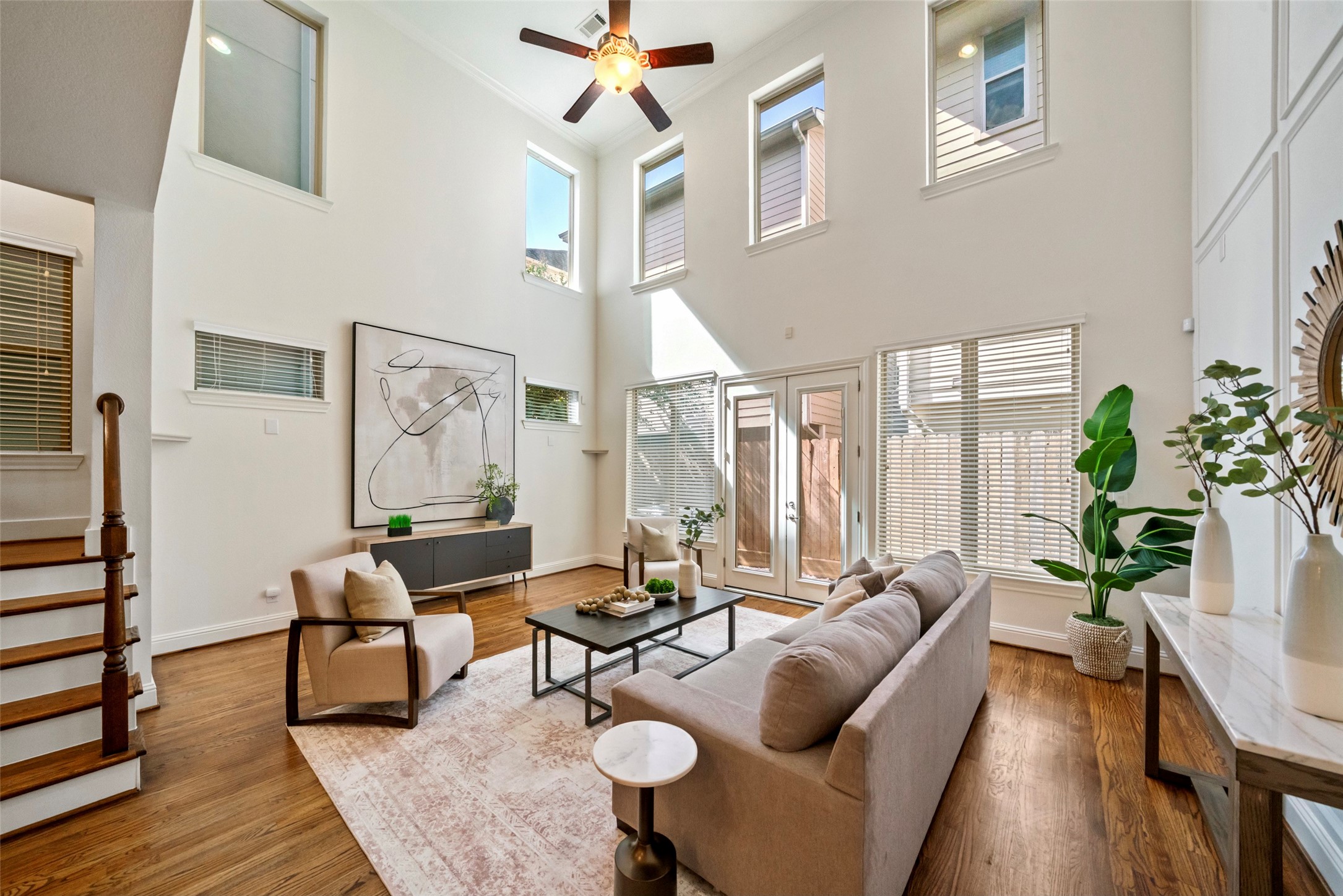 Light and bright with rich, solid hardwood flooring.