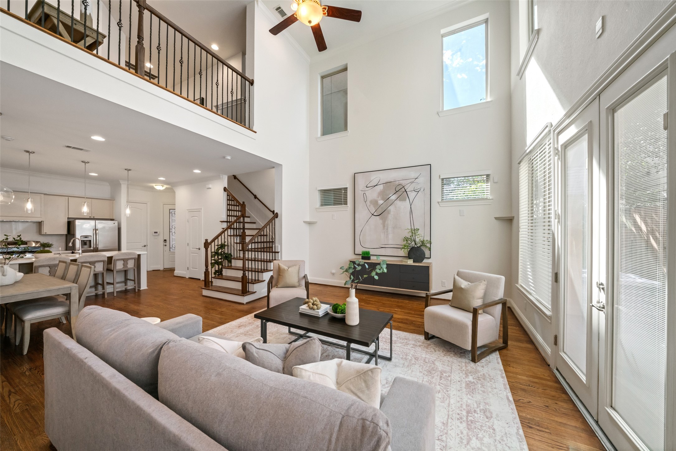 Welcome home! Stunning, soaring ceiling in the first floor living with the second floor office/flex space overlooking.