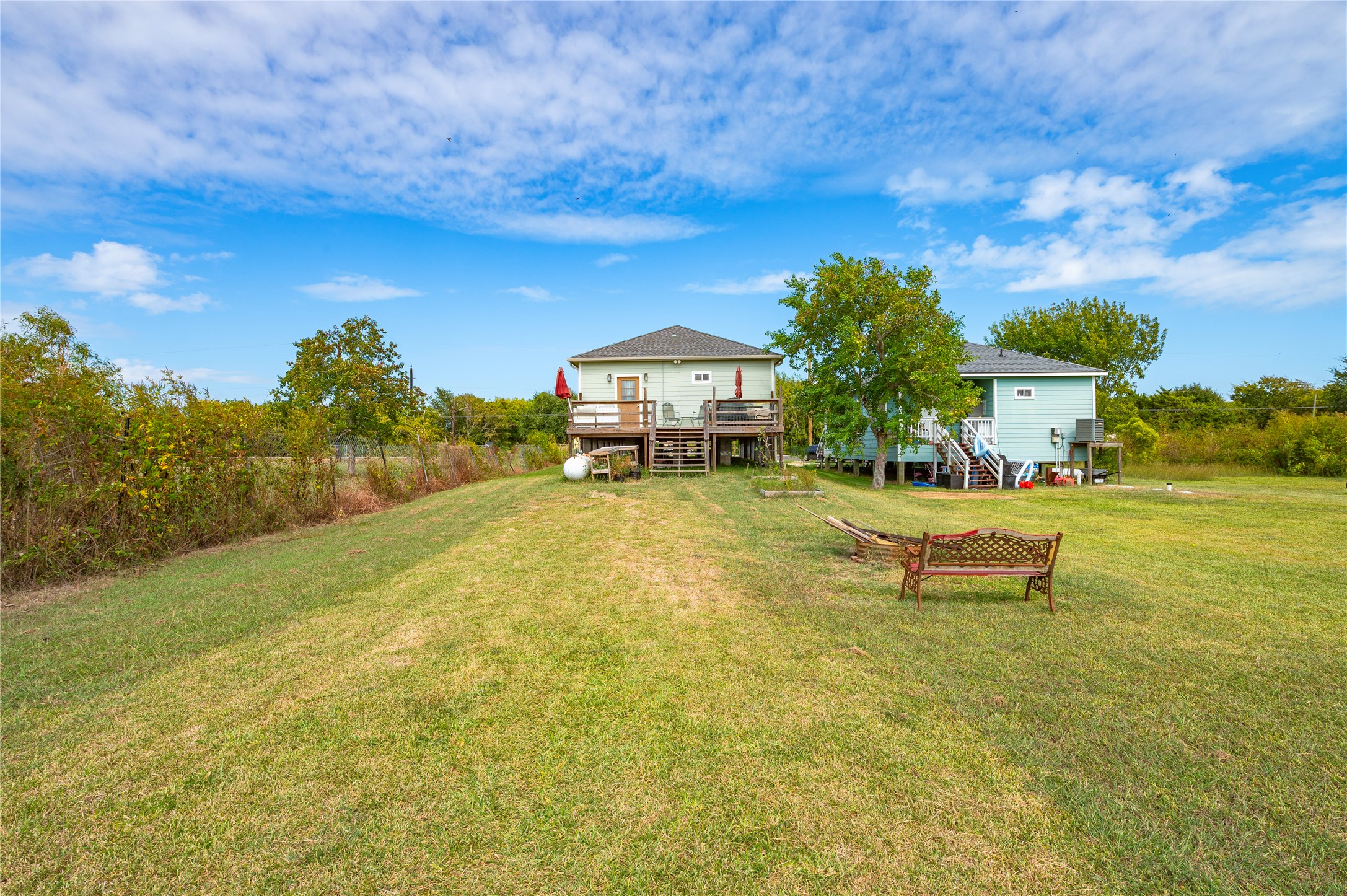 Another view of the large backyard and home.