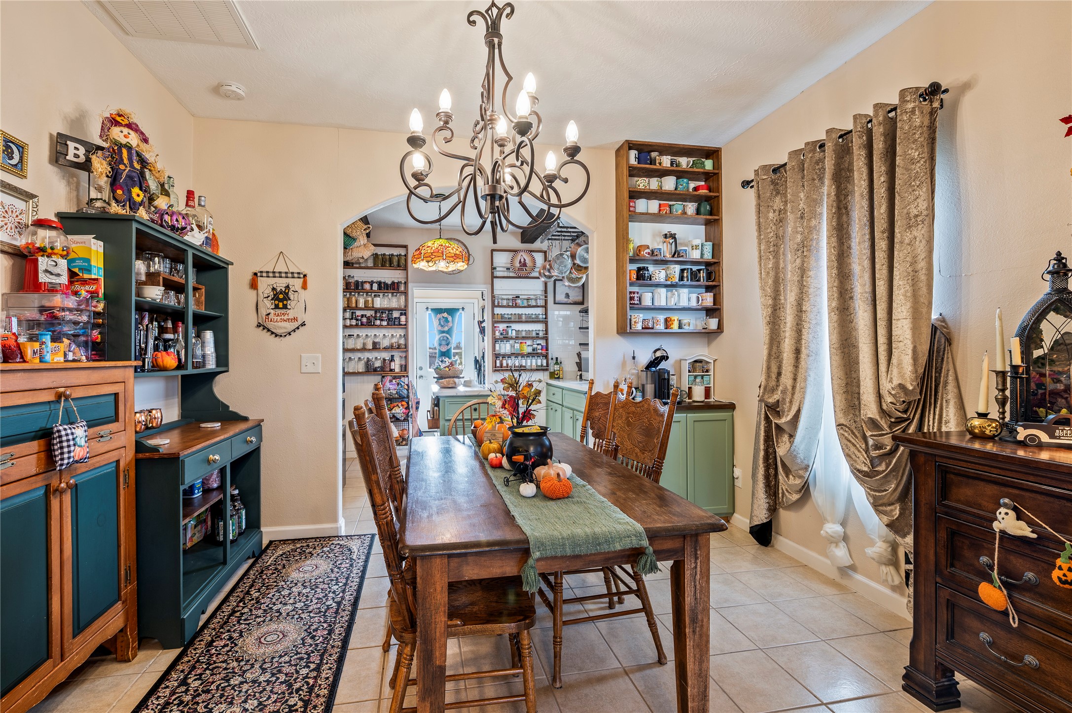 Beautiful hanging light fixture in the dining room area.
