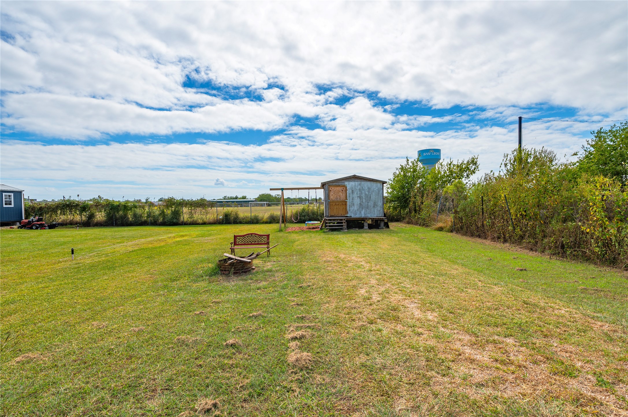 Ample backyard space leads to the back of the property.