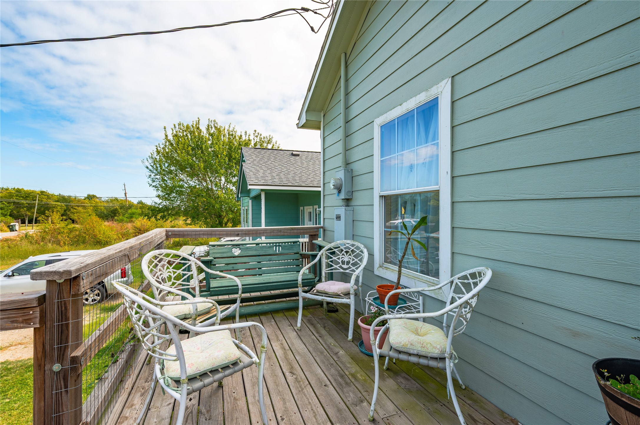 Ample space on the front deck for multiple sitting areas and decor. Ample space on the front deck for multiple sitting areas and decor.