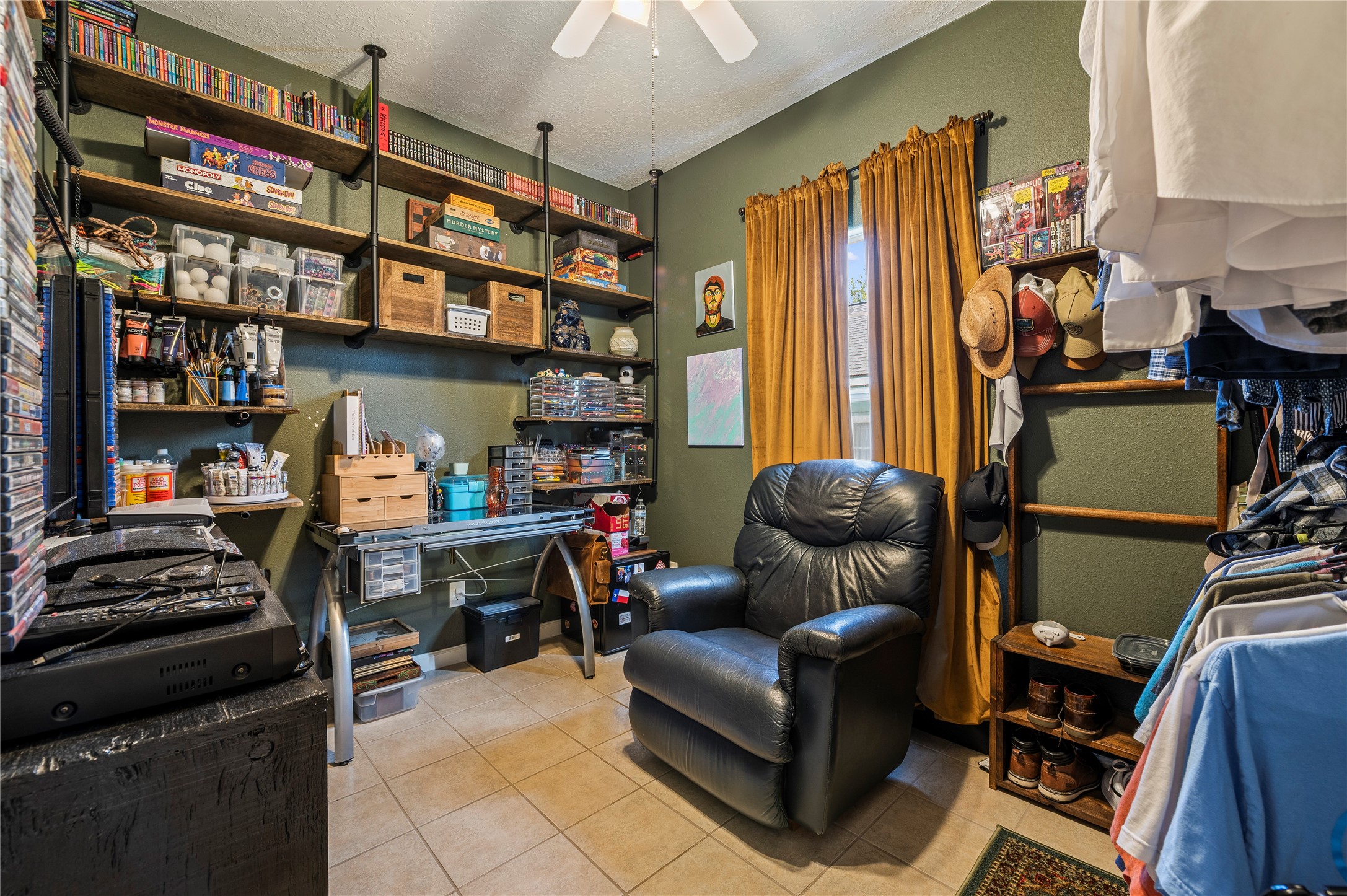 3rd bedroom is also spacious with tile flooring and ceiling fan fixture.