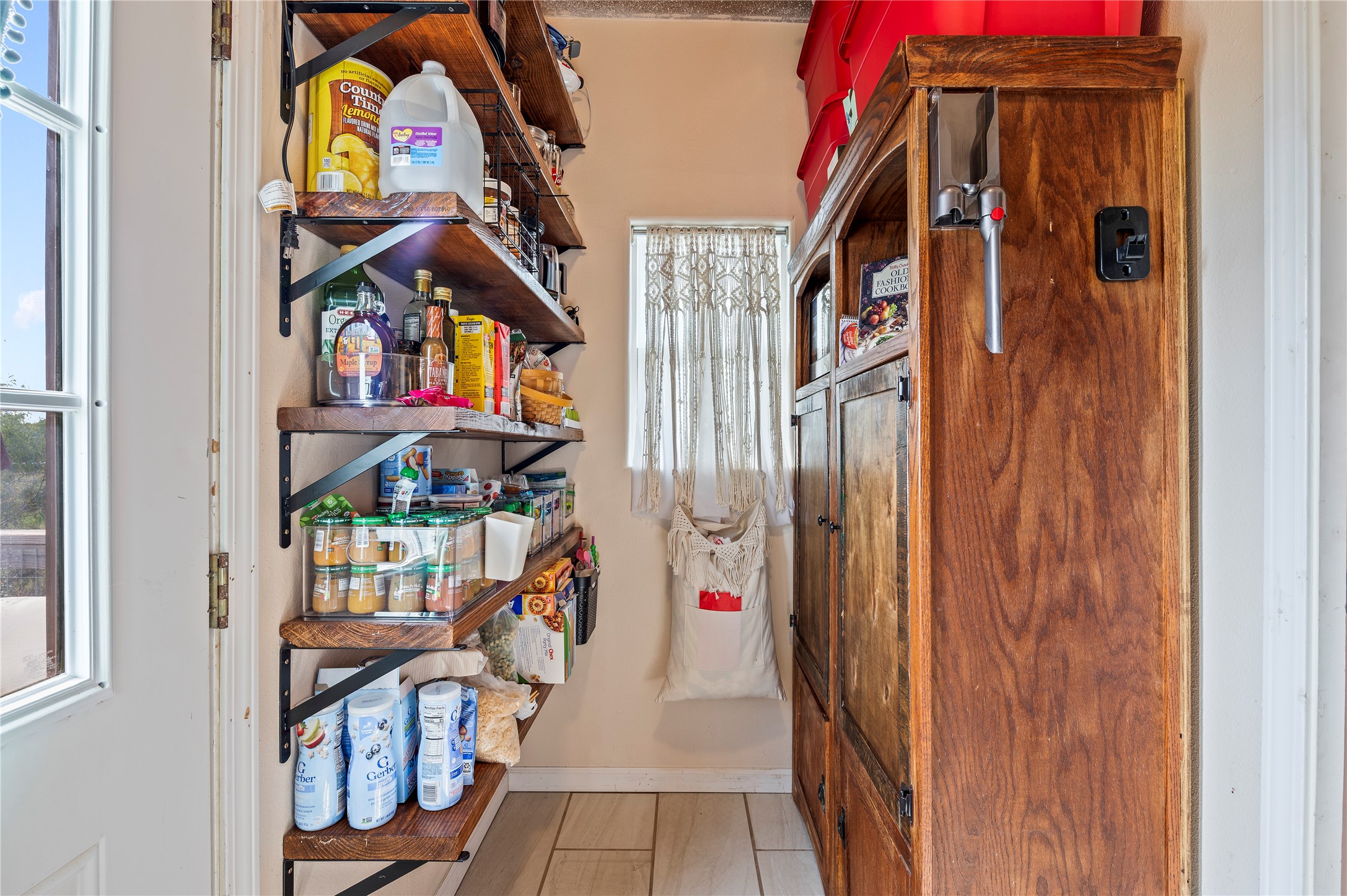 Built in shelving is a great place for pantry items and more.