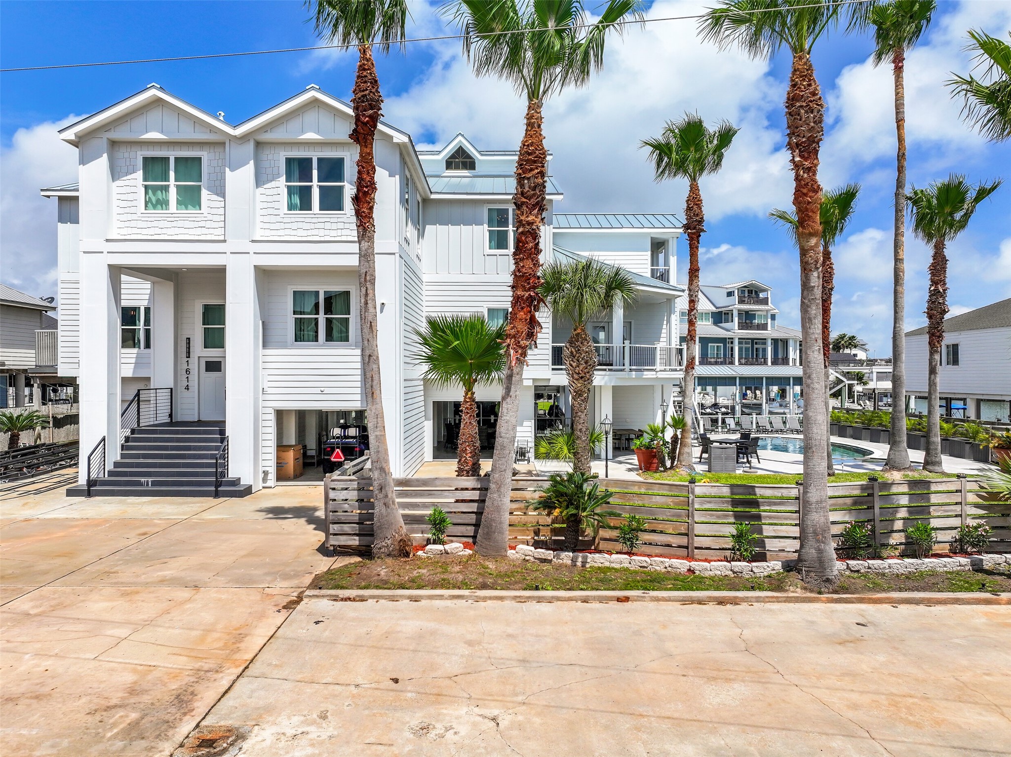 THIS is Tiki Island living on a different scale. Two waterfront lots with 132 feet of canal frontage create an incredible setting for boating, entertaining and making life on the water an everyday experience.