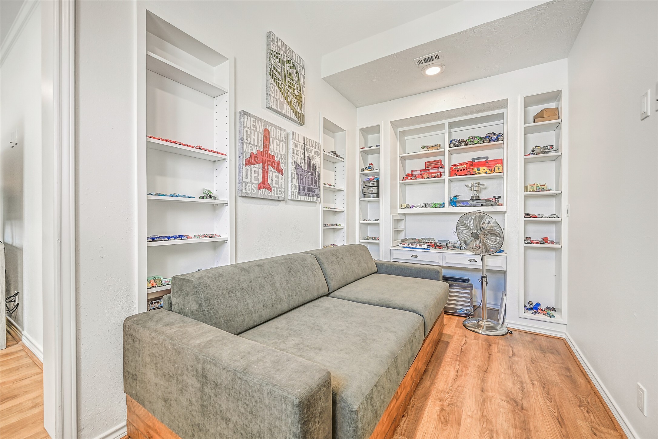 This bedroom offers space for more than sleeping. The additional sitting area can become a reading nook, private lounge or favorite hideaway.