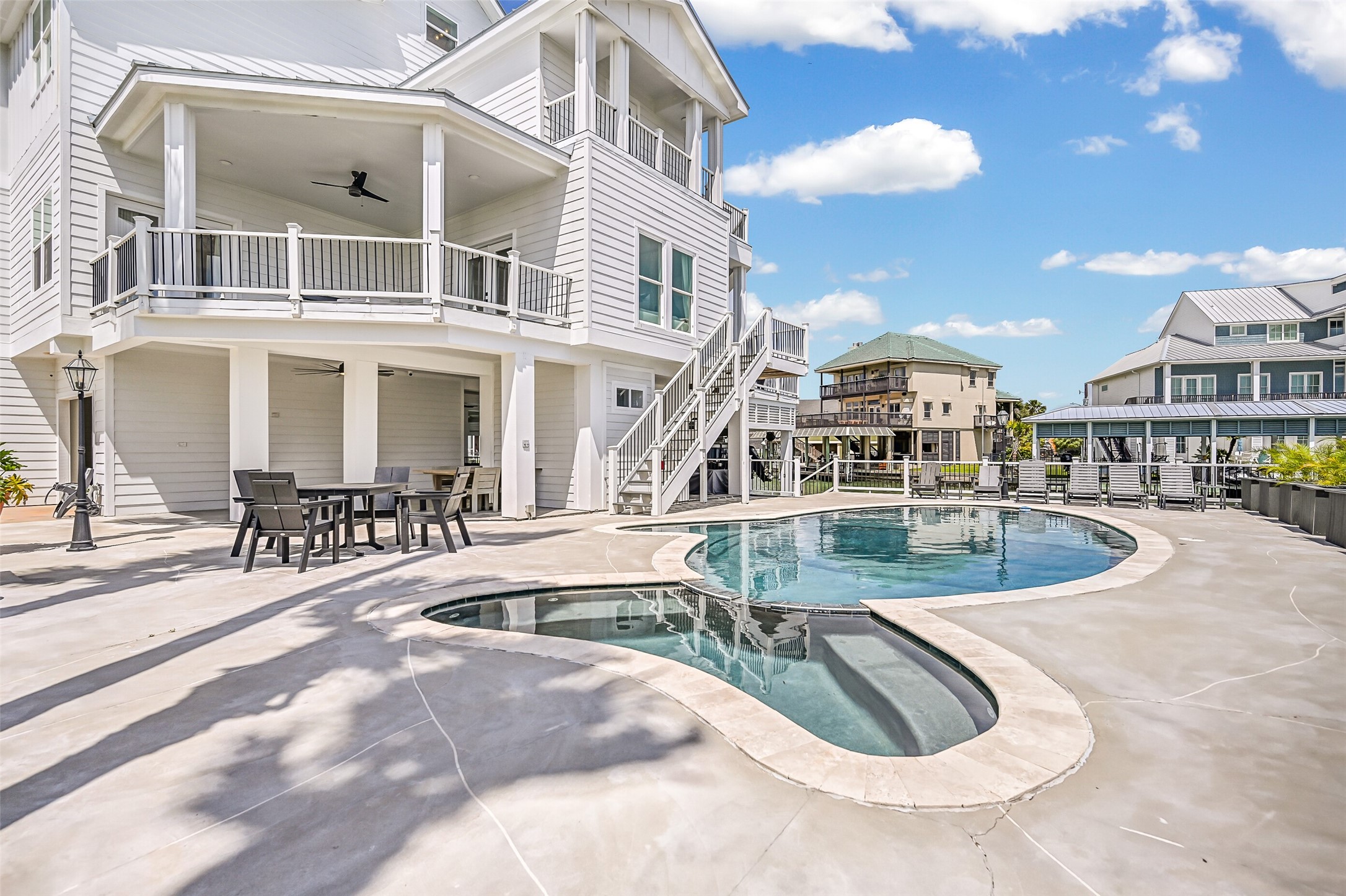 Why leave home when the backyard feels like a getaway? A heated pool and spa pair beautifully with the waterfront setting for sun-filled afternoons and relaxing evenings outside.