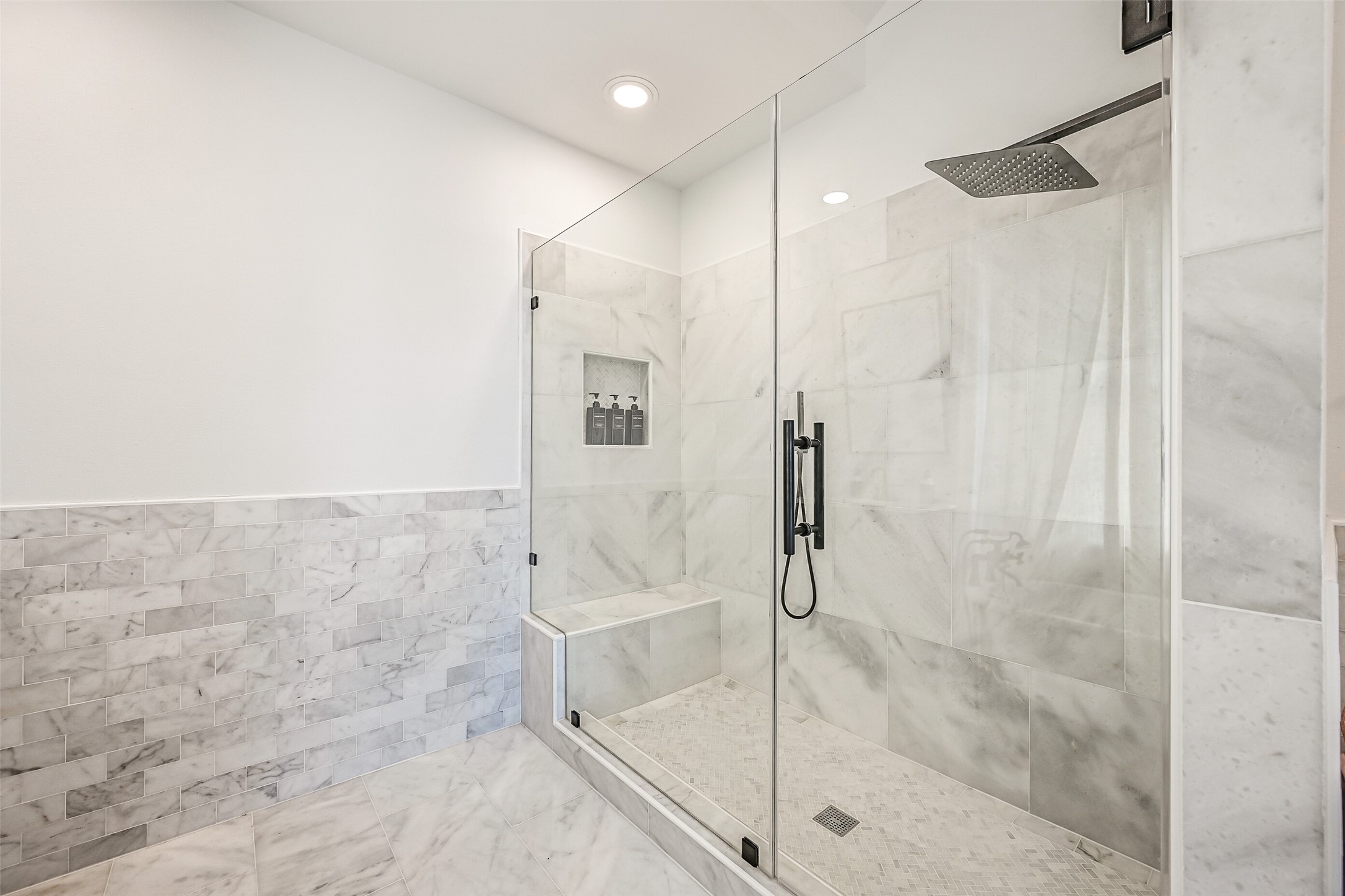The spacious walk-in shower brings everyday comfort to the main-level accommodations. Guests can settle in without feeling like they are simply borrowing space.